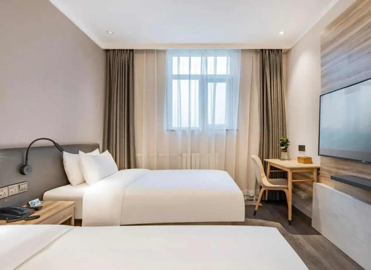 Bed in Hanting Premium Hotel Beijing South Railway Station Majiapu Bed in Hanting Premium Hotel Beijing South Railway Station Majiapu