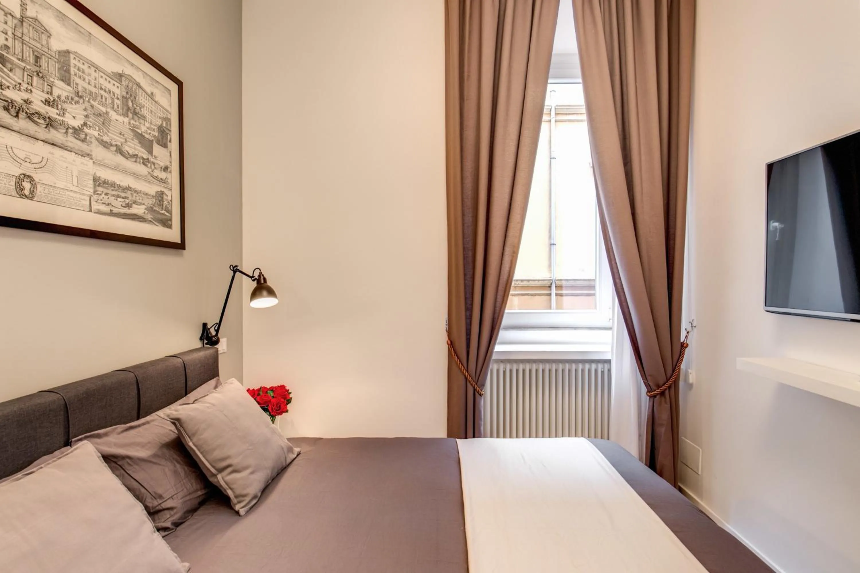 Photo of the whole room, Bed in Orange Suites