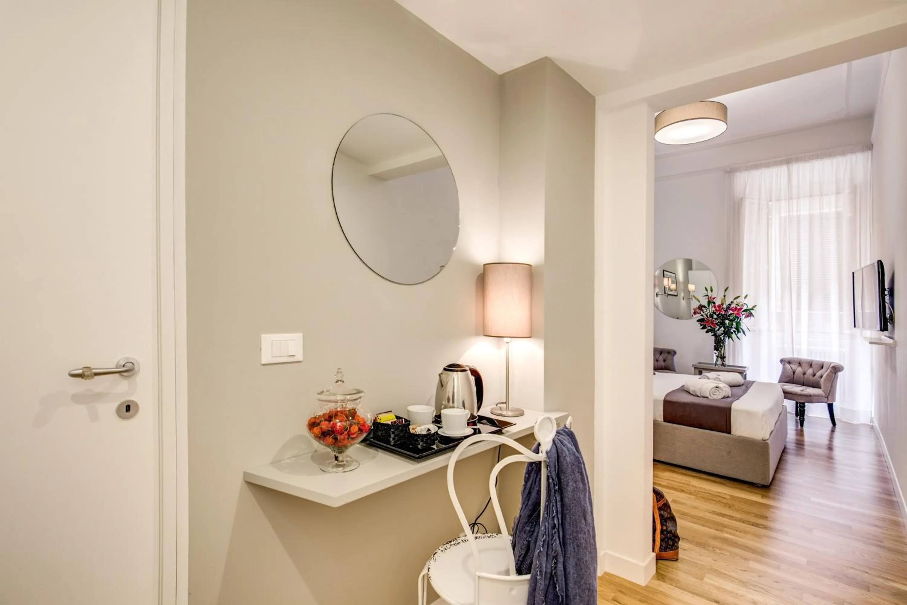 Photo of the whole room, Bed in Orange Suites