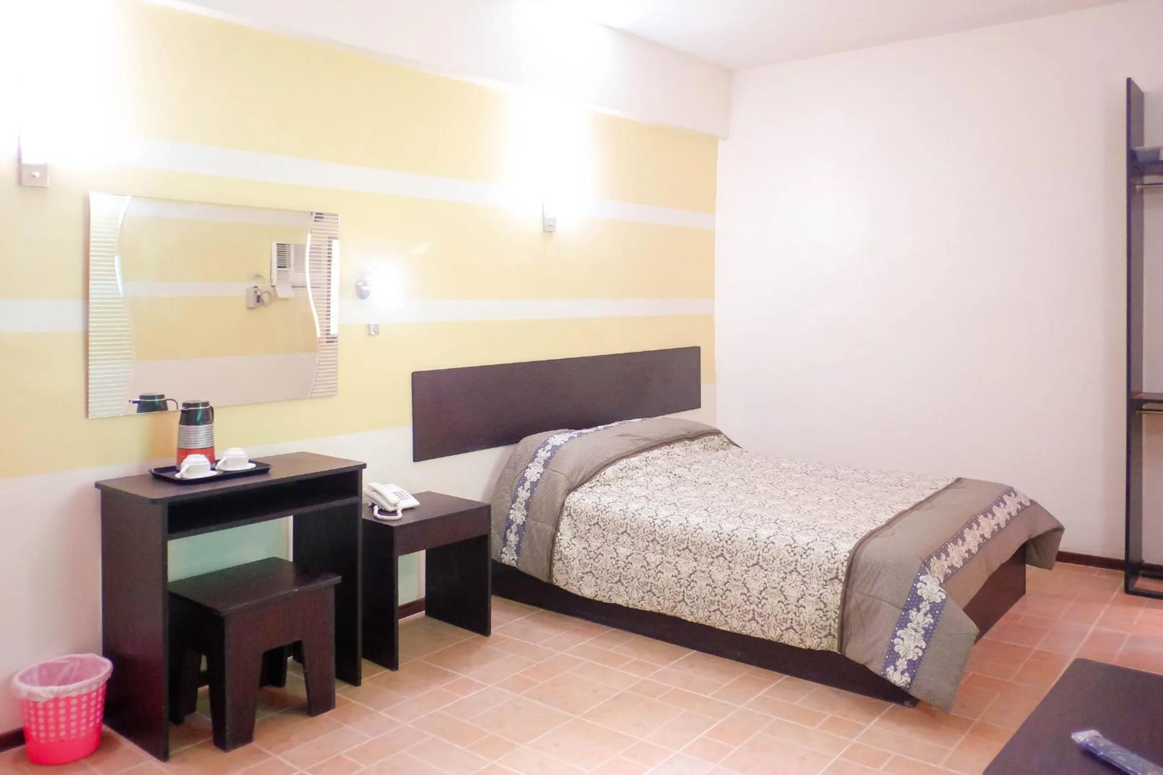 Photo of the whole room, Bed in Metro Park Hotel Mandaue