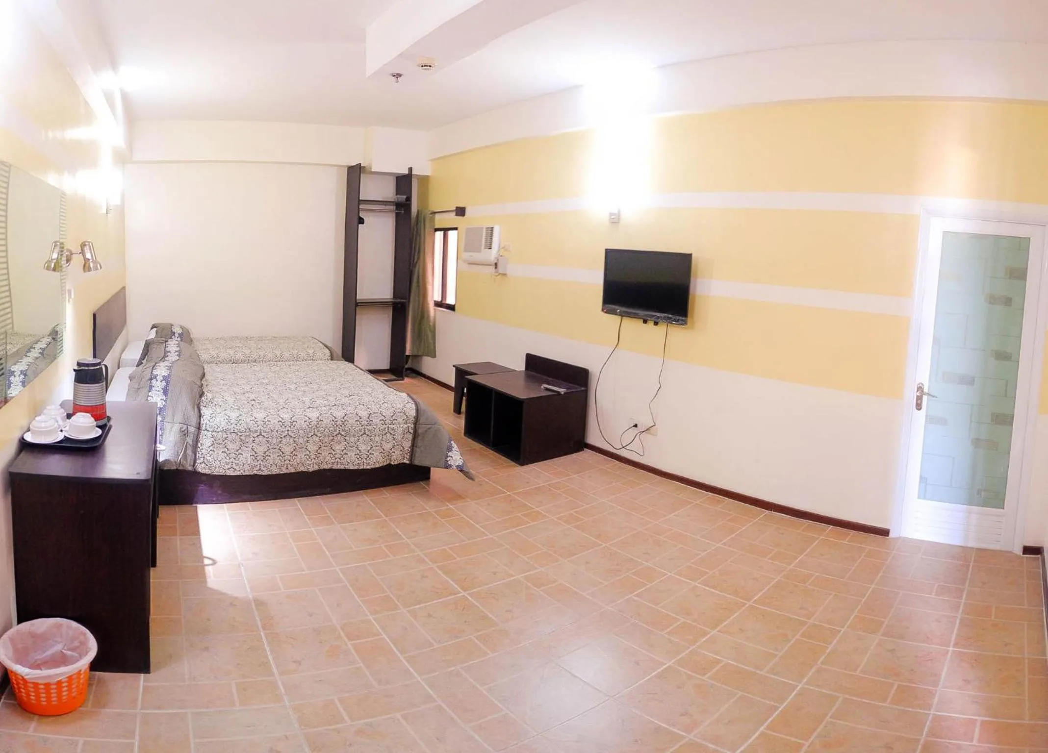 Photo of the whole room, Bed in Metro Park Hotel Mandaue