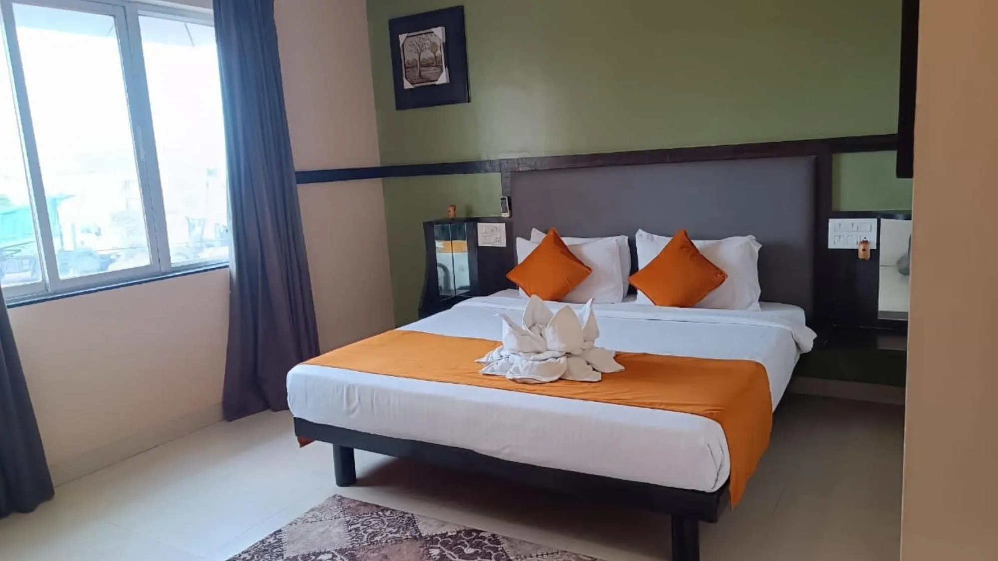 Bed in Hotel Pooja Garden, Nanded