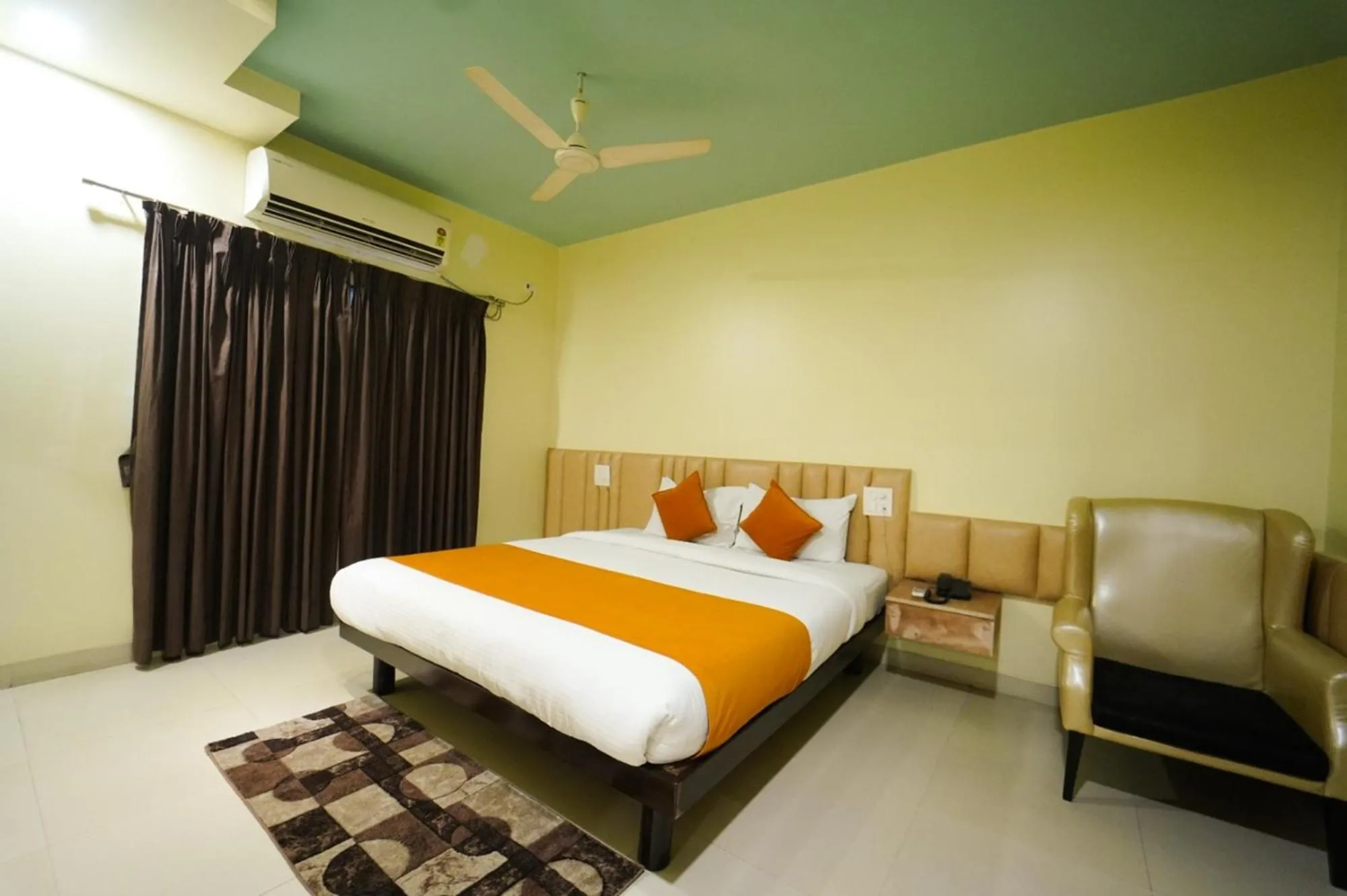 Photo of the whole room, Bed in Hotel Pooja Garden, Nanded