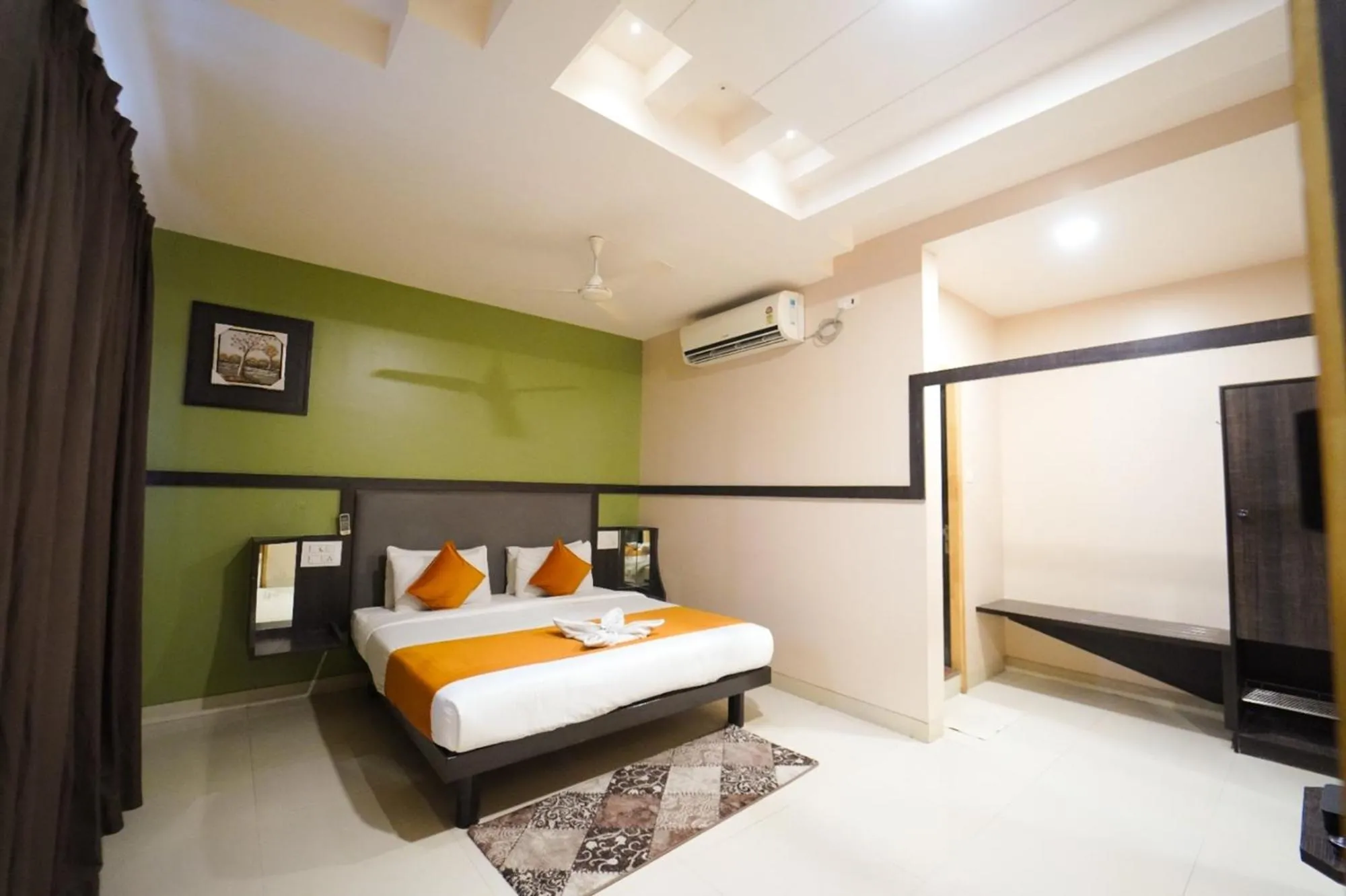 Photo of the whole room, Bed in Hotel Pooja Garden, Nanded