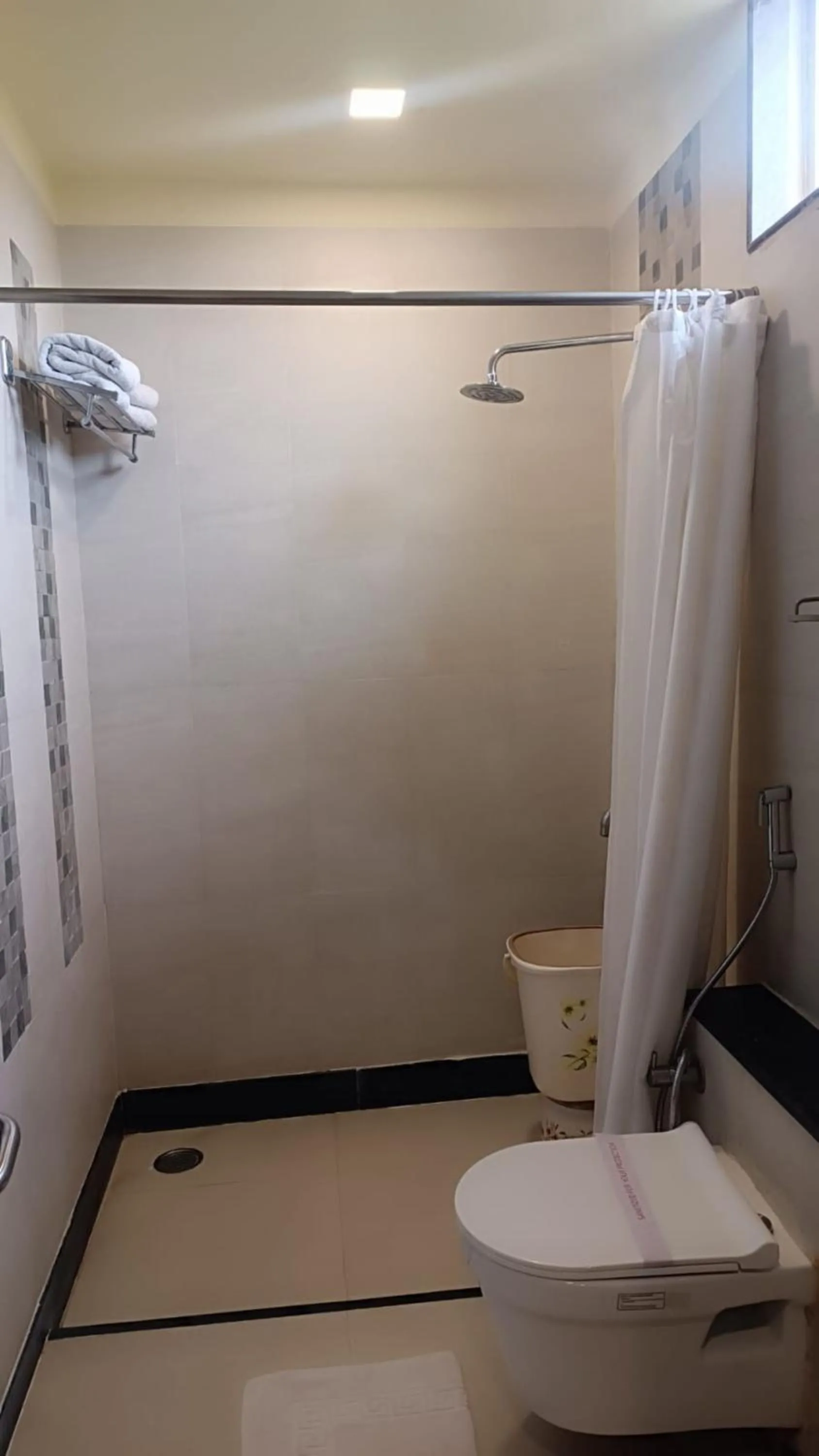 Shower in Hotel Pooja Garden, Nanded