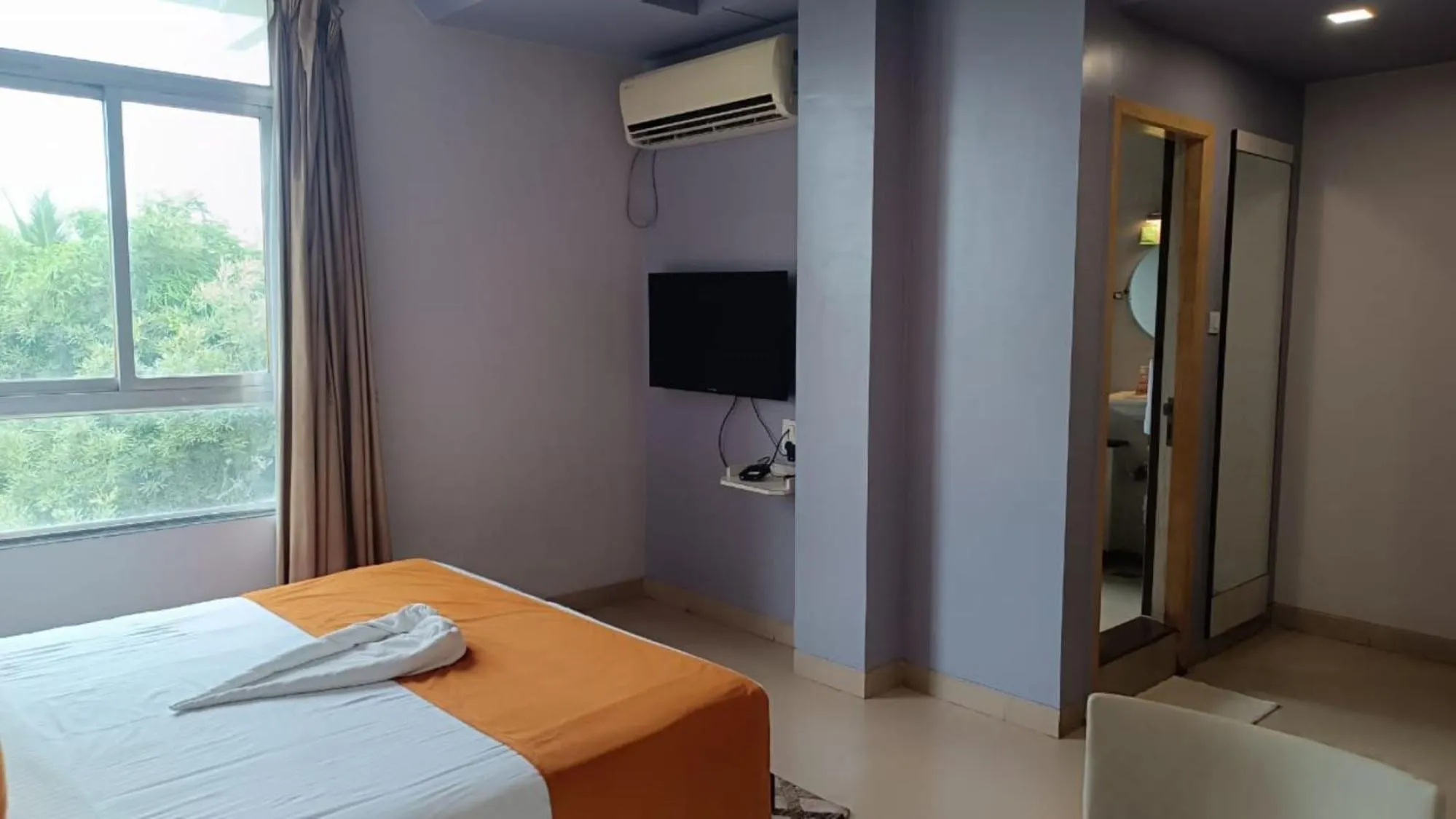 Bed in Hotel Pooja Garden, Nanded