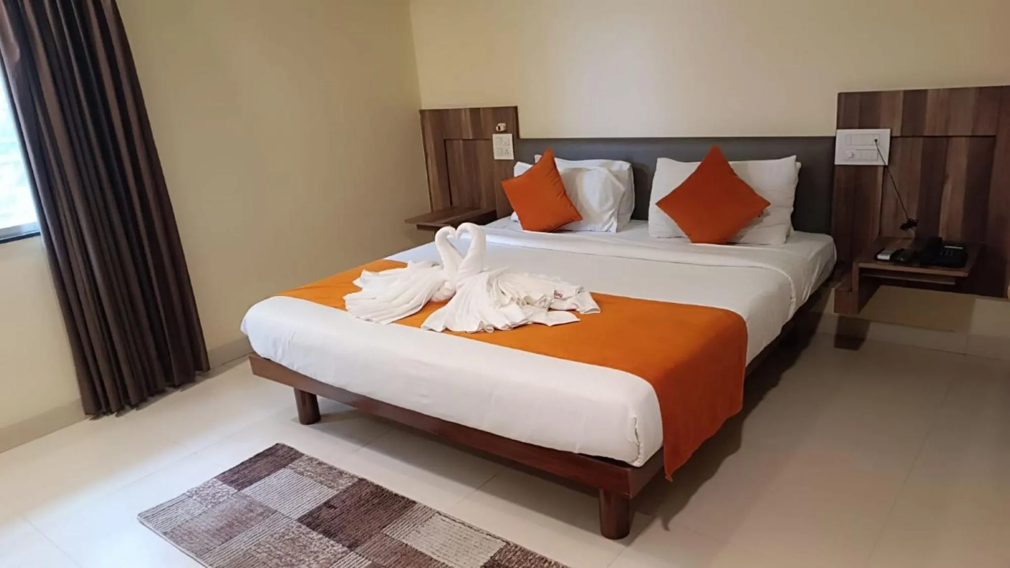 Bed in Hotel Pooja Garden, Nanded