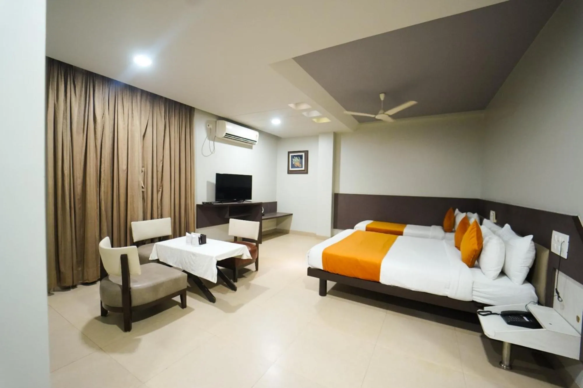 Photo of the whole room, Bed in Hotel Pooja Garden, Nanded