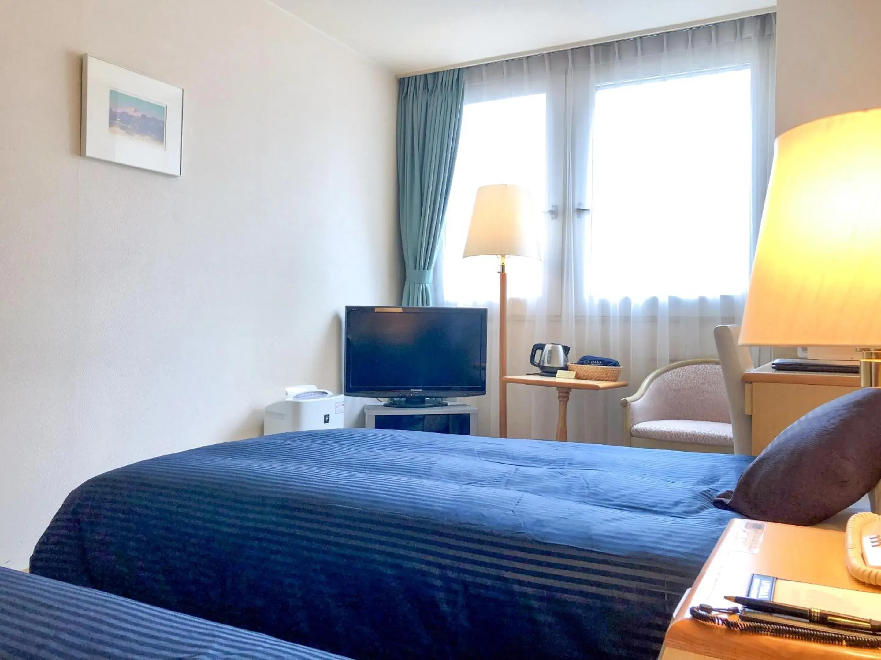 Photo of the whole room, Bed in HOTEL LiVEMAX Sapporo Ekimae Photo of the whole room, Bed in HOTEL LiVEMAX Sapporo Ekimae