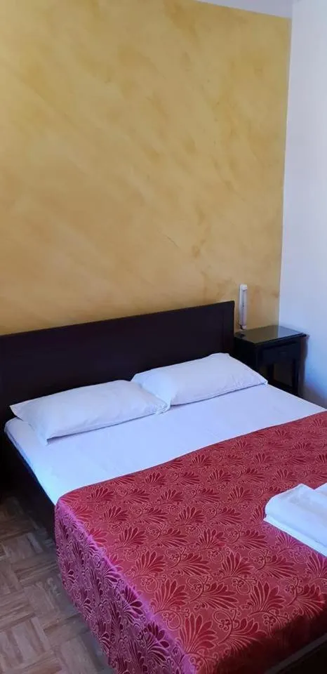 Bed in Hotel Giovannina