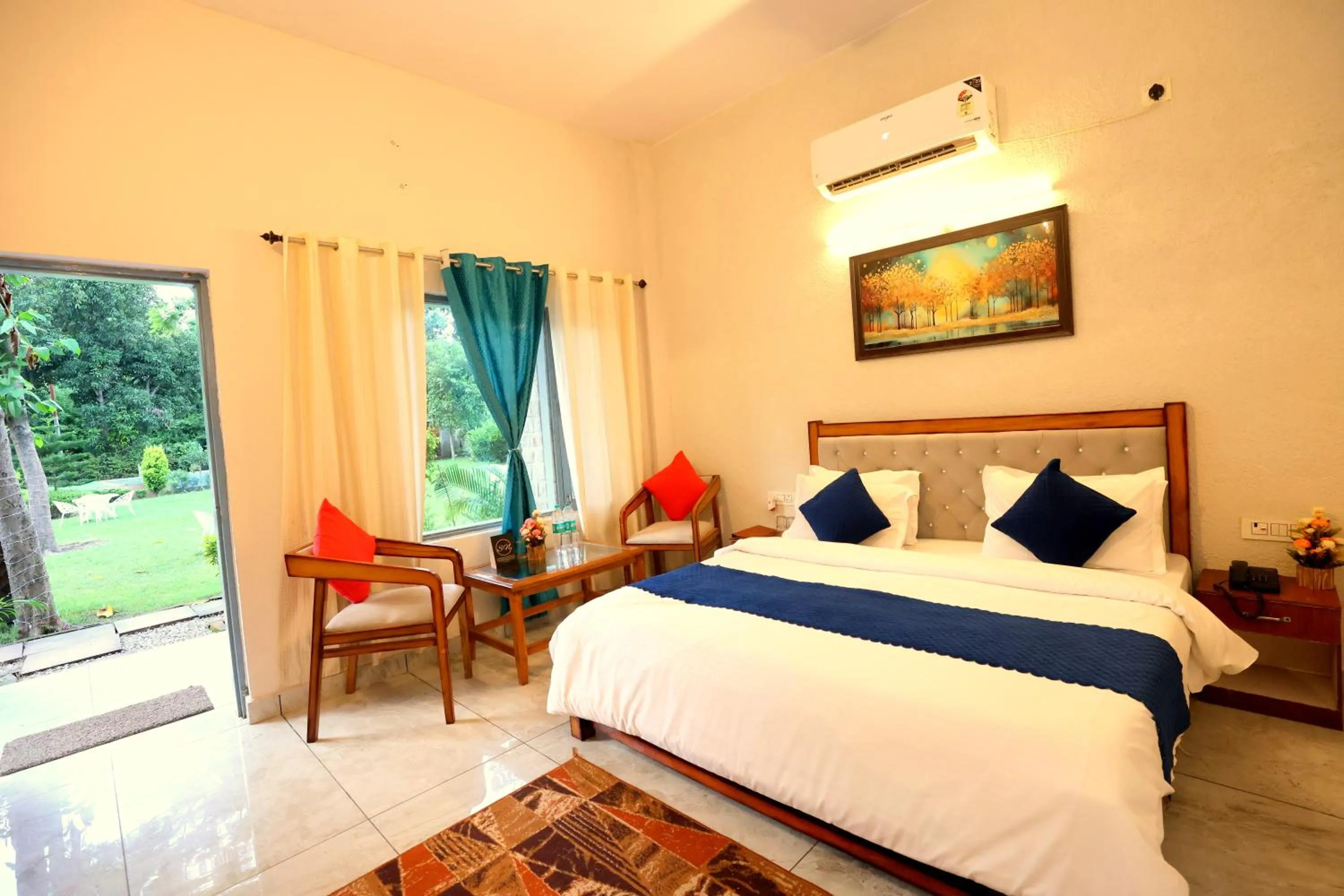 Photo of the whole room, Bed in Aranya Resort & Suites By Shivaneel Hospitality