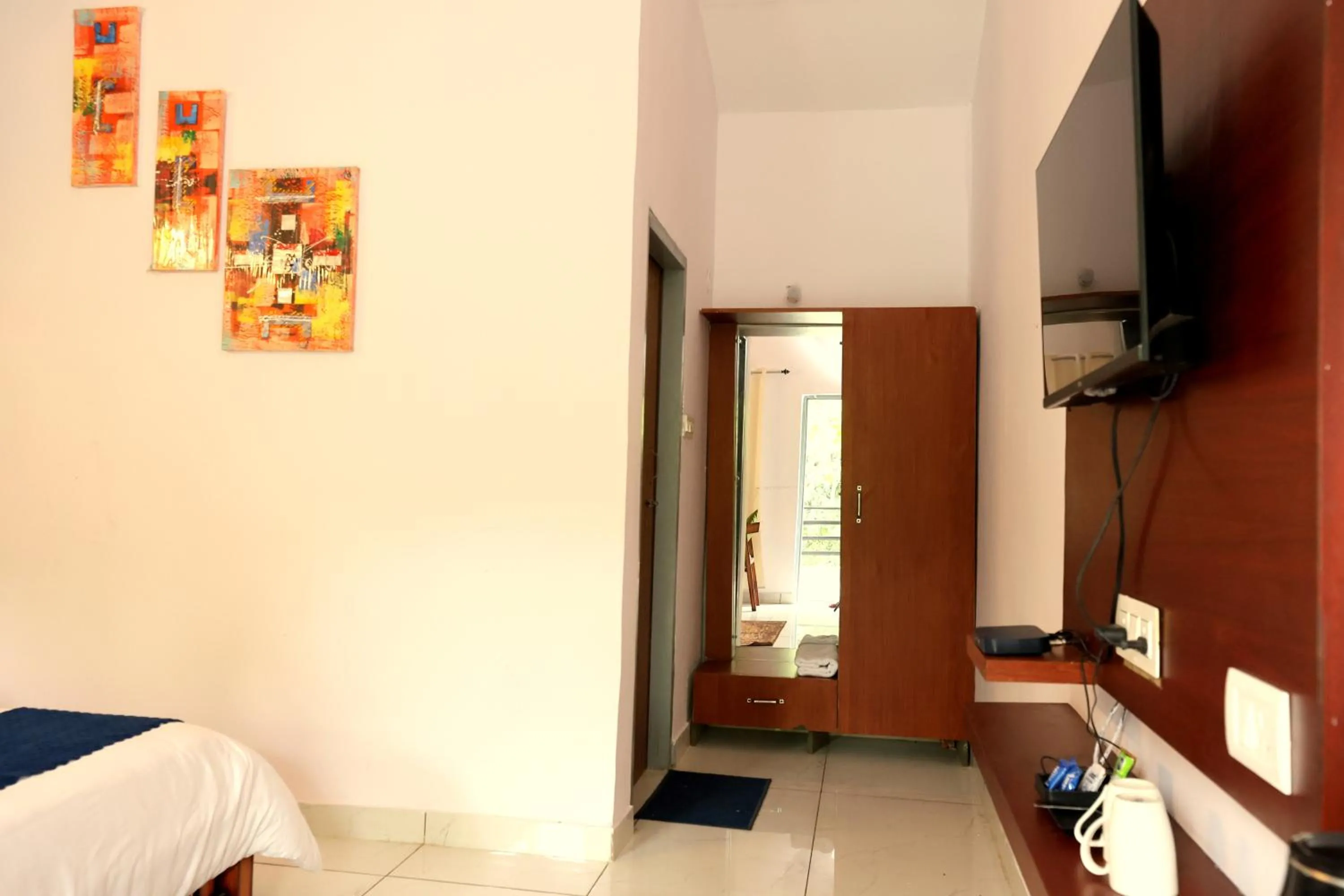 Photo of the whole room, Bed in Aranya Resort & Suites By Shivaneel Hospitality