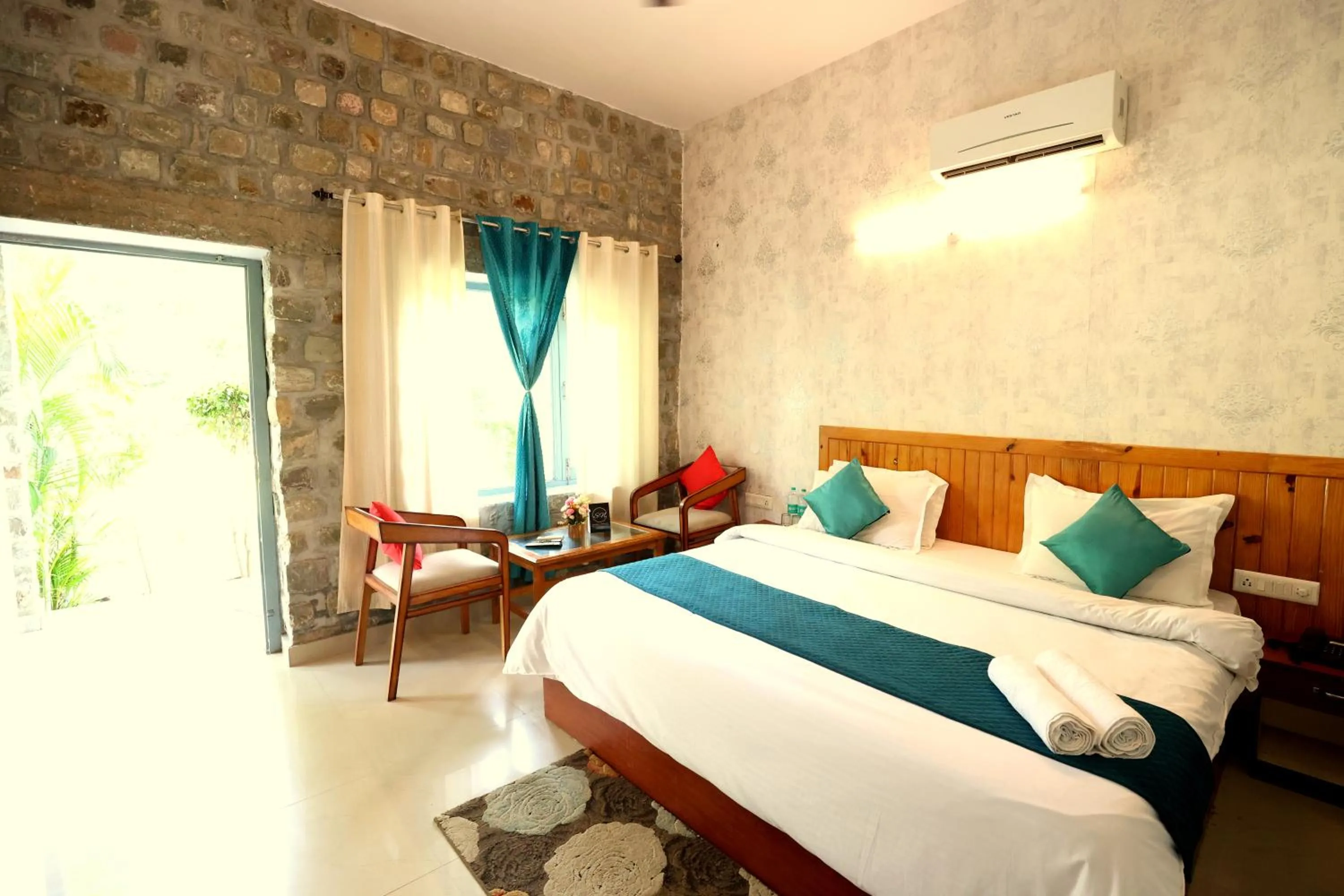 Living room, Bed in Aranya Resort & Suites By Shivaneel Hospitality