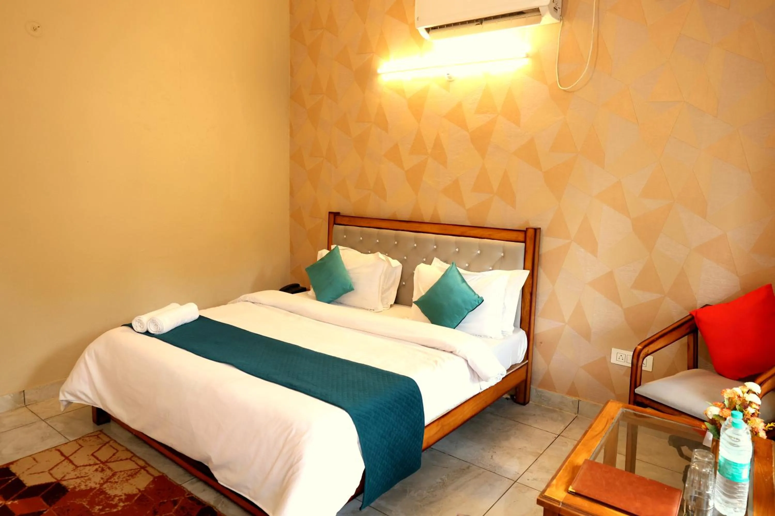 Bed in Aranya Resort & Suites By Shivaneel Hospitality