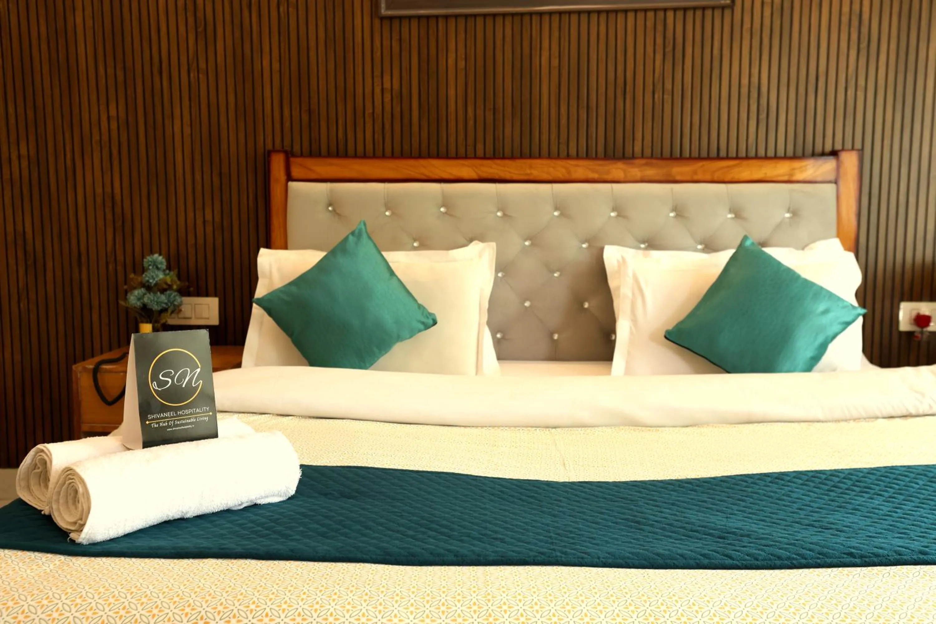 Bed in Aranya Resort & Suites By Shivaneel Hospitality