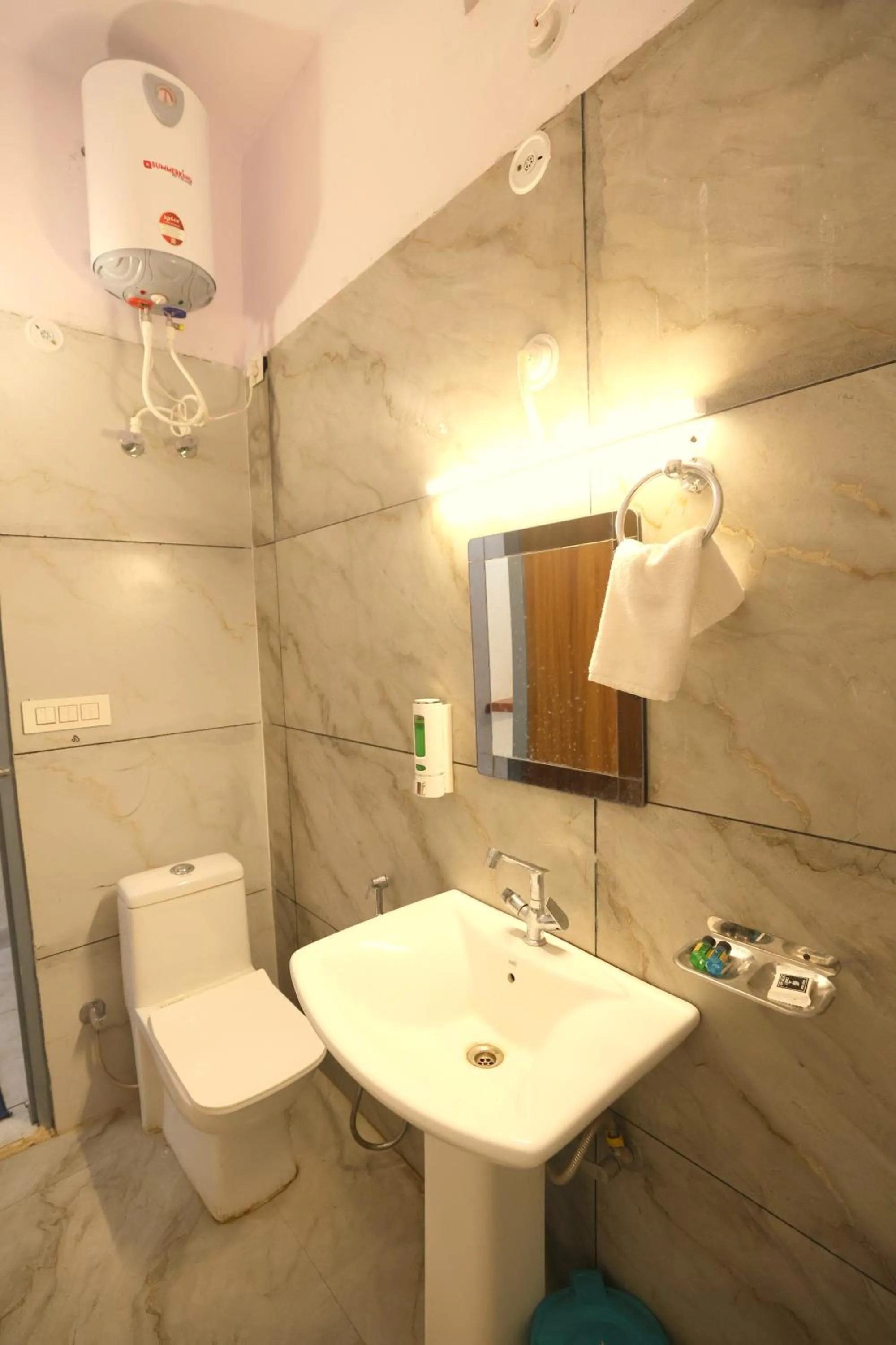Bathroom in Aranya Resort & Suites By Shivaneel Hospitality