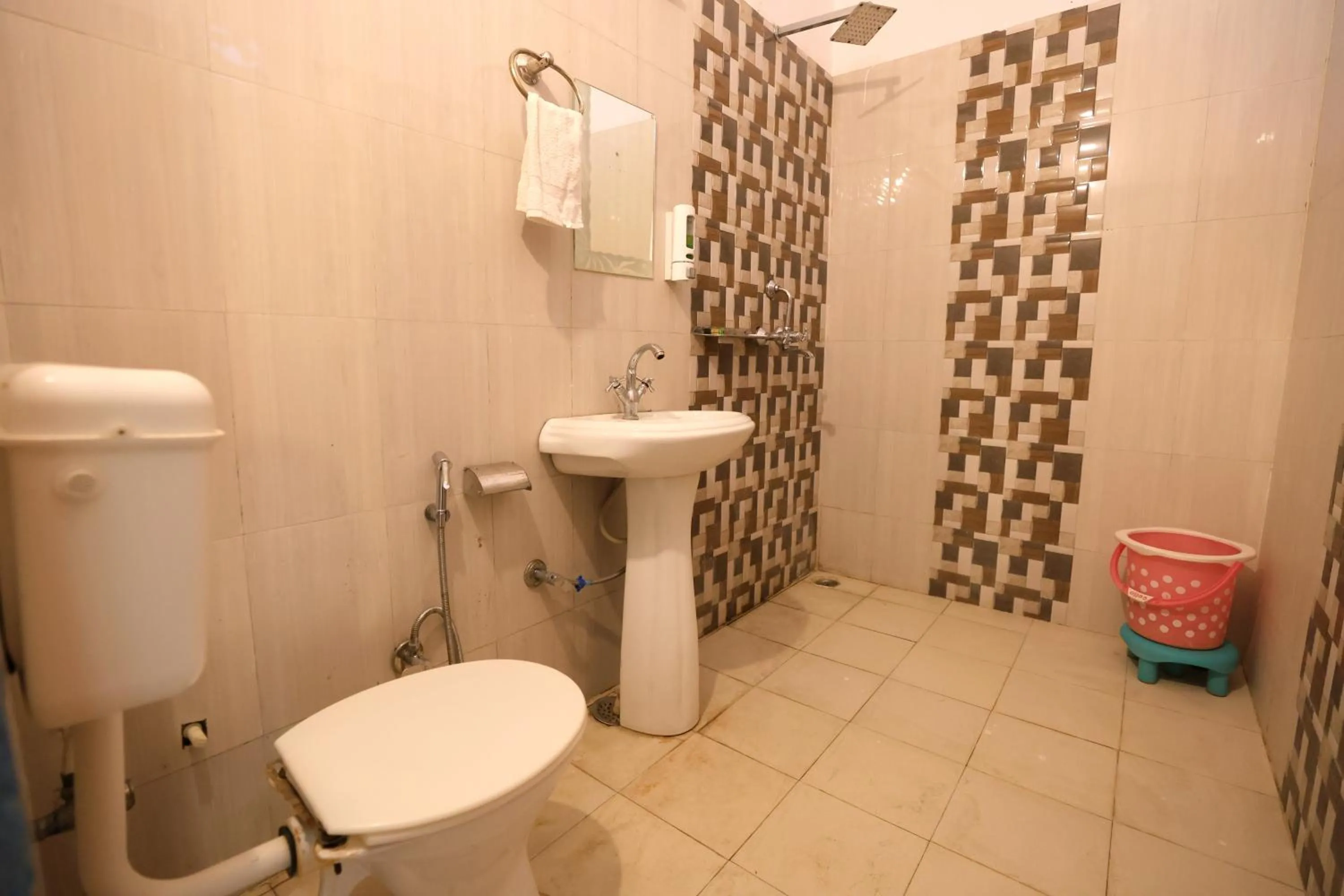 Bathroom in Aranya Resort & Suites By Shivaneel Hospitality