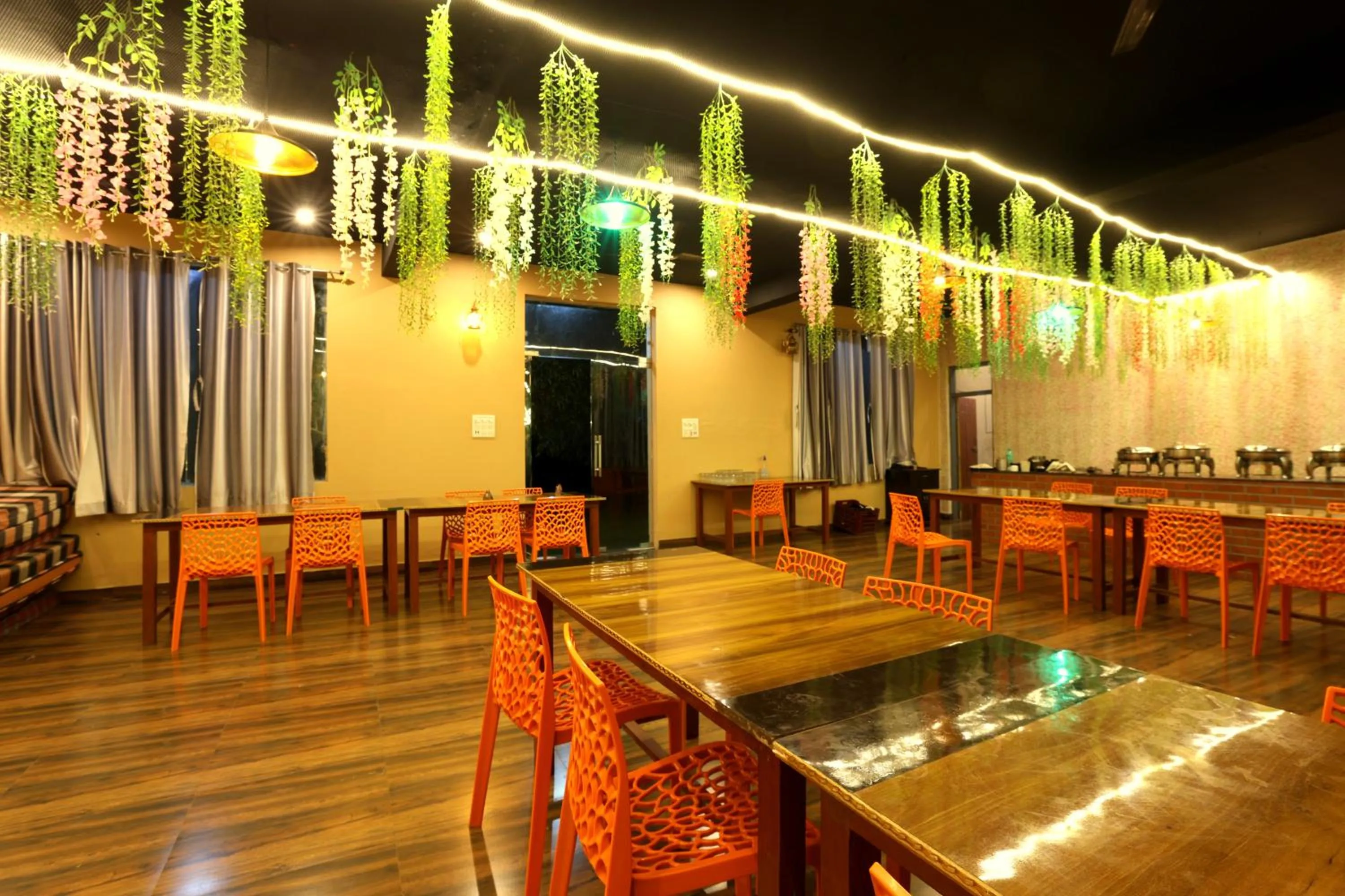Restaurant/places to eat in Aranya Resort & Suites By Shivaneel Hospitality