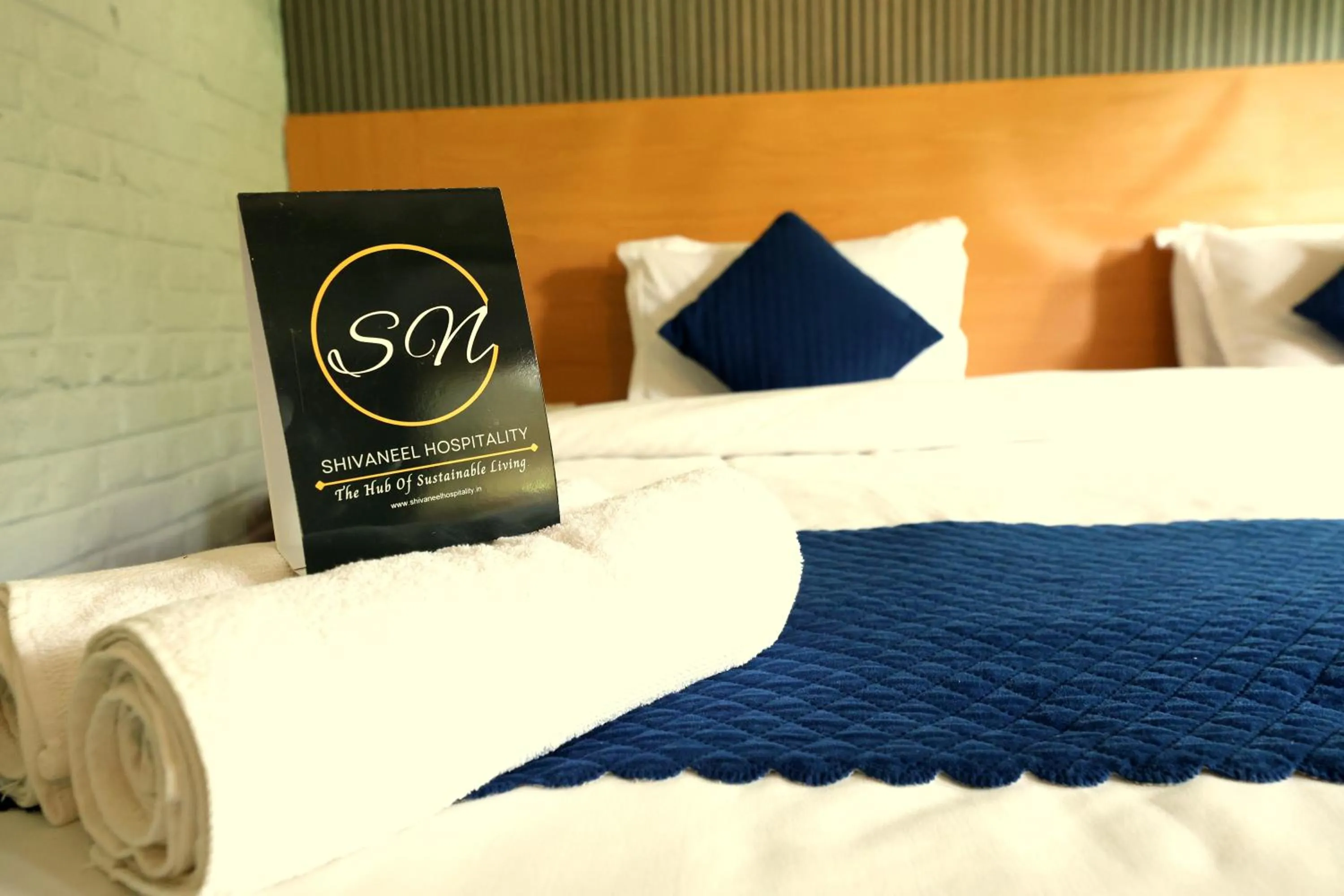 Bed in Aranya Resort & Suites By Shivaneel Hospitality