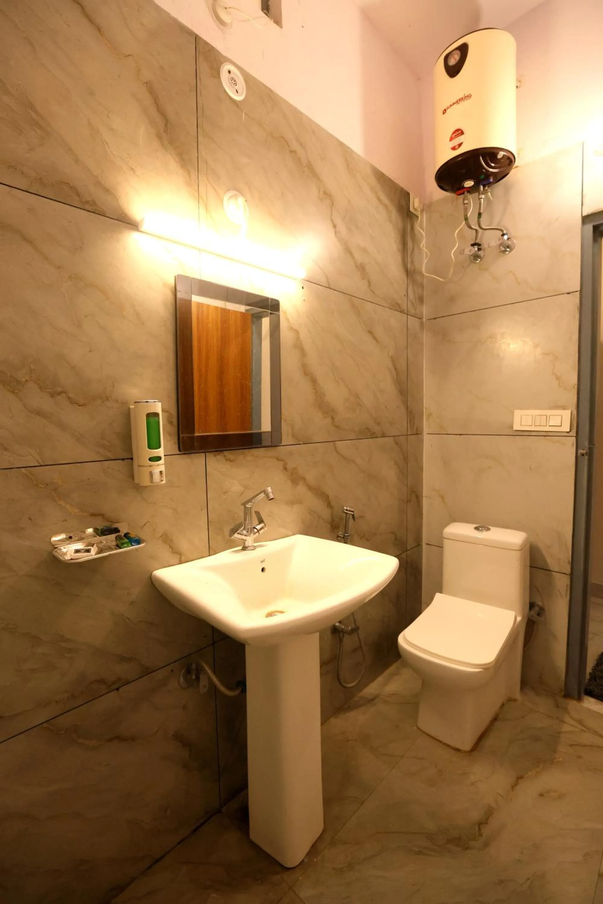Bathroom in Aranya Resort & Suites By Shivaneel Hospitality