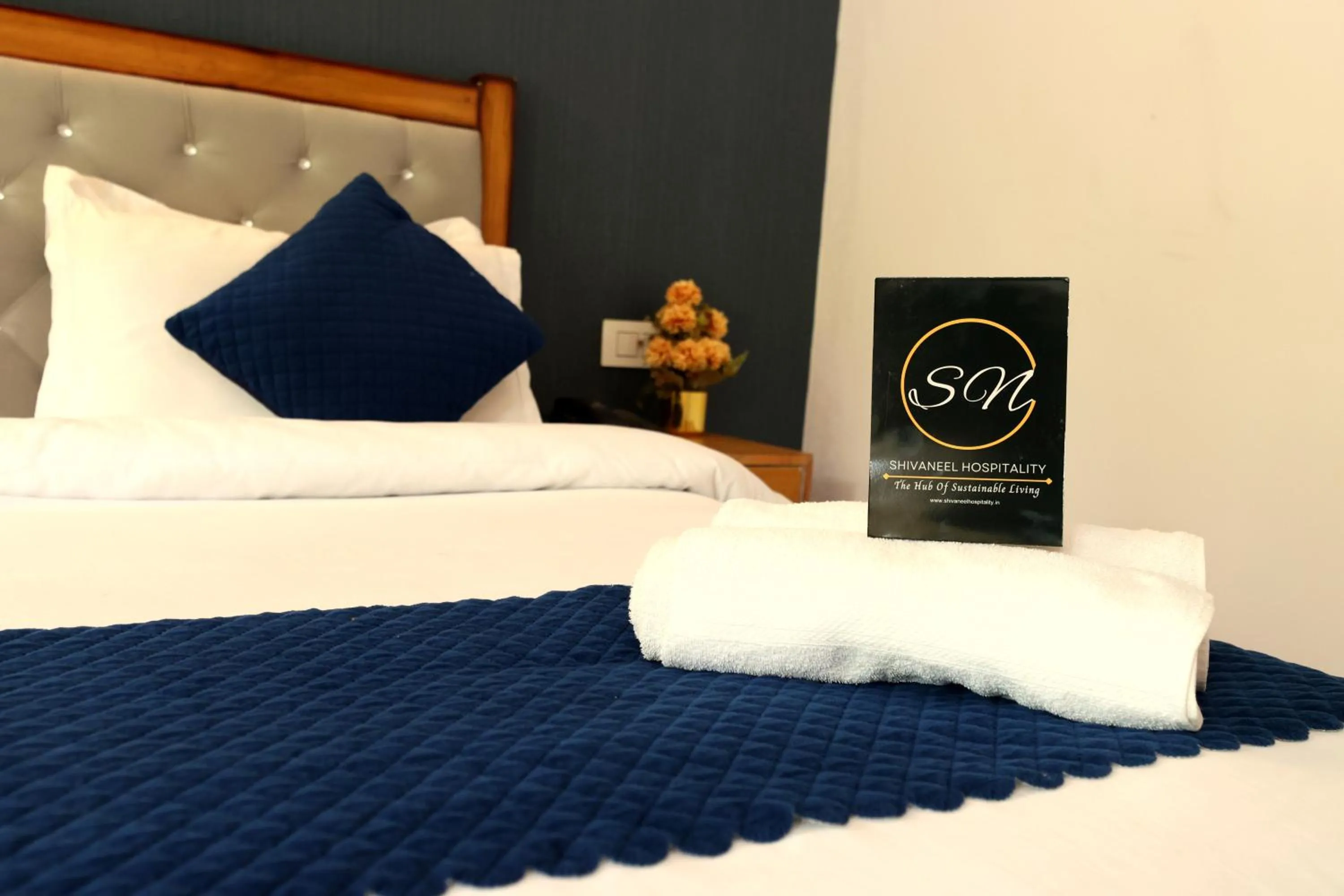 Bed in Aranya Resort & Suites By Shivaneel Hospitality