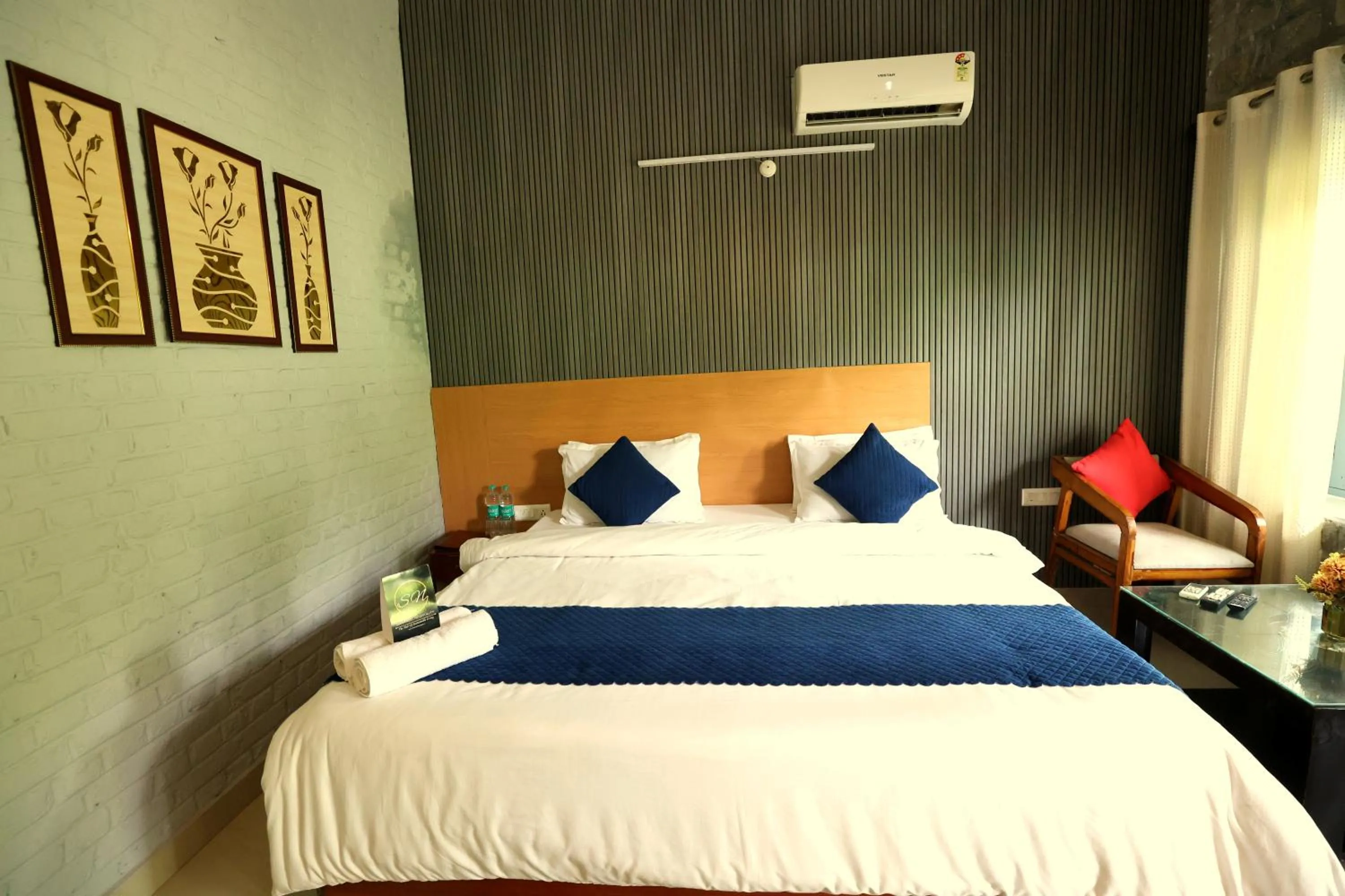 Bed in Aranya Resort & Suites By Shivaneel Hospitality
