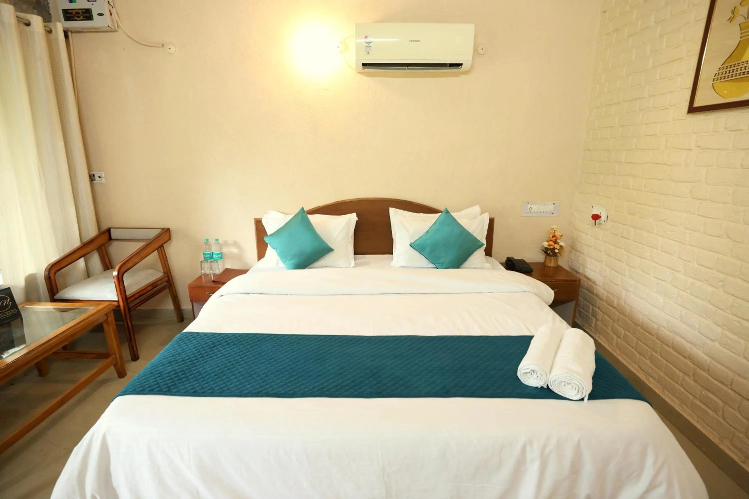 Bed in Aranya Resort & Suites By Shivaneel Hospitality