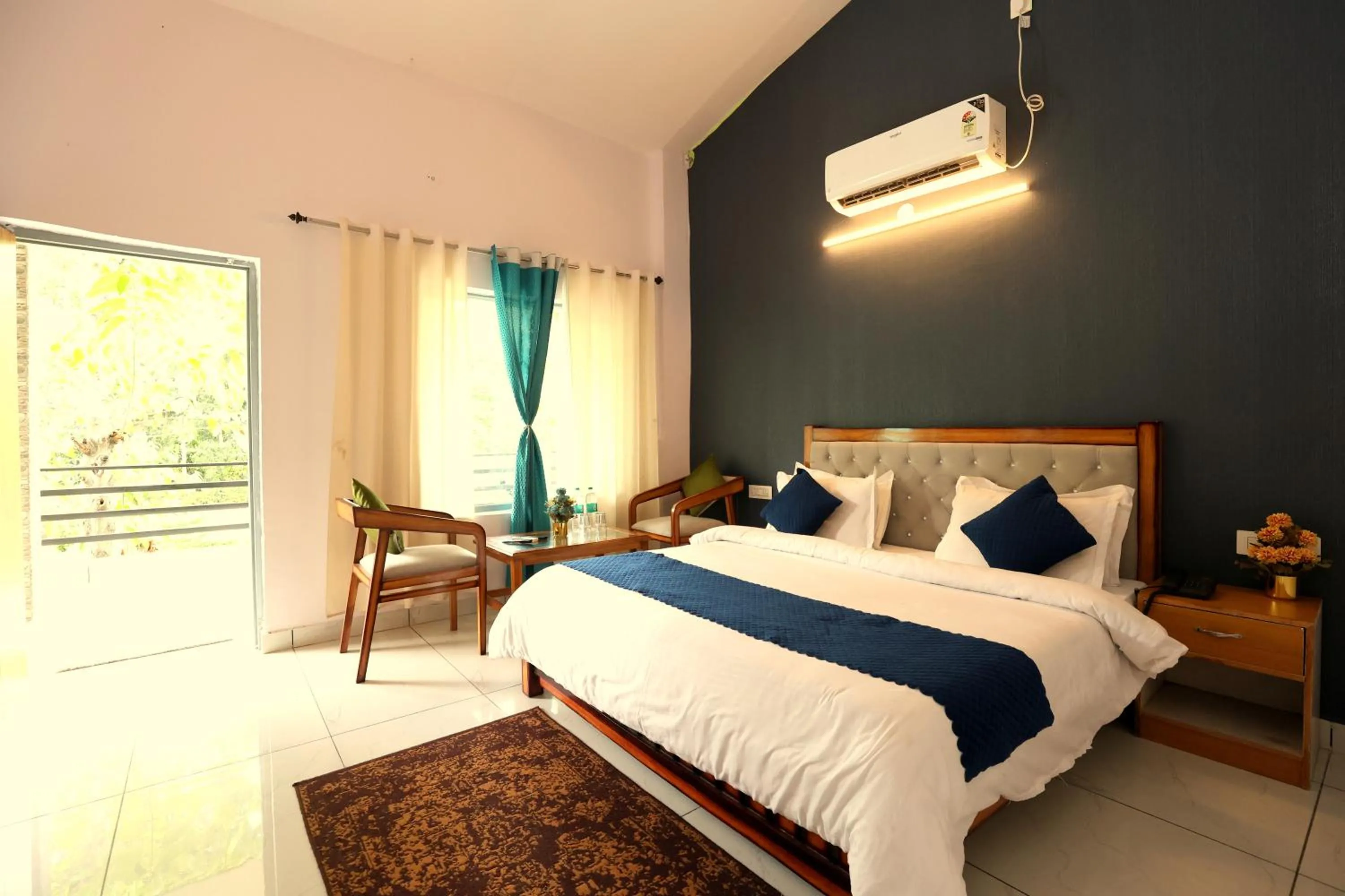 Photo of the whole room, Bed in Aranya Resort & Suites By Shivaneel Hospitality
