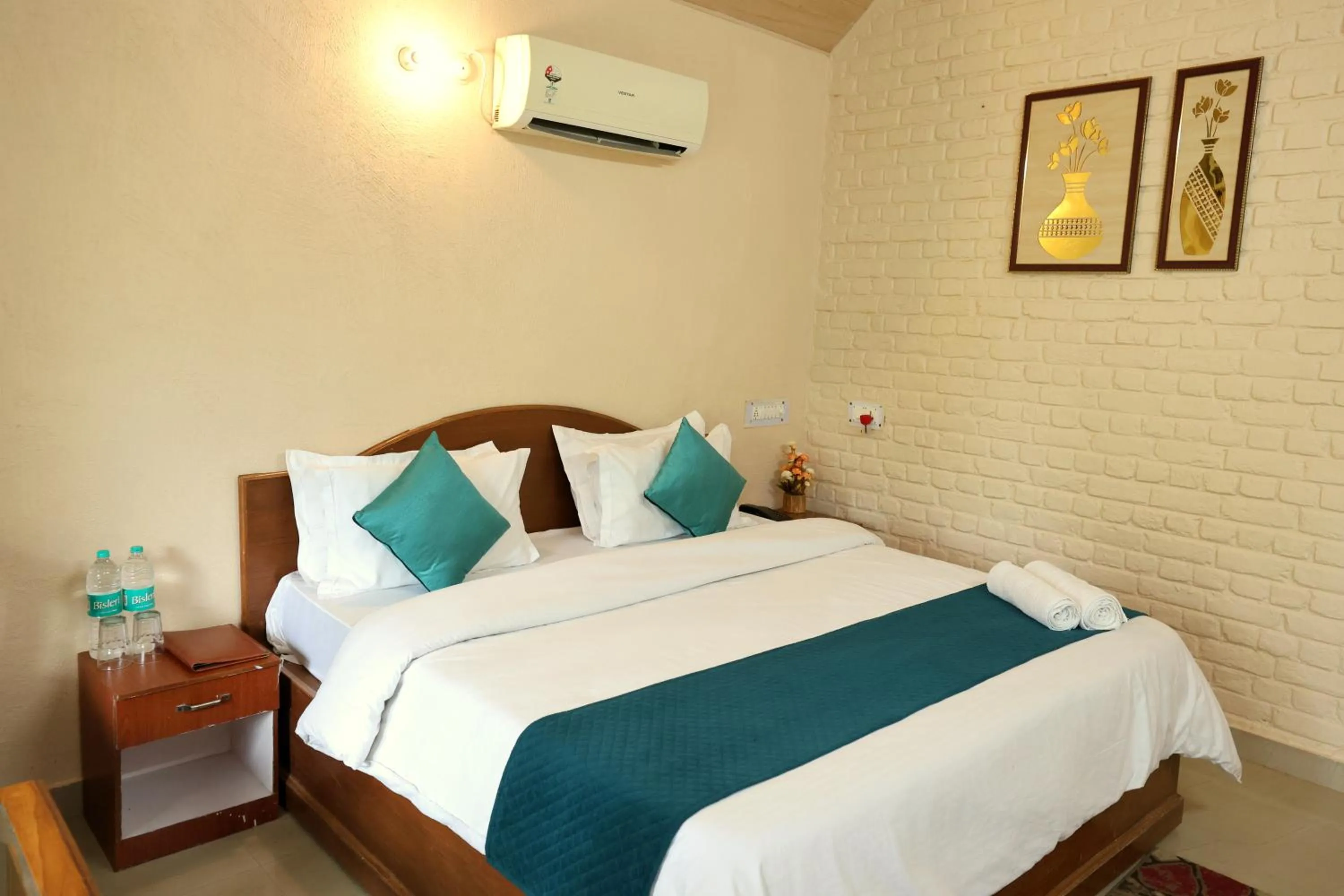 Photo of the whole room, Bed in Aranya Resort & Suites By Shivaneel Hospitality