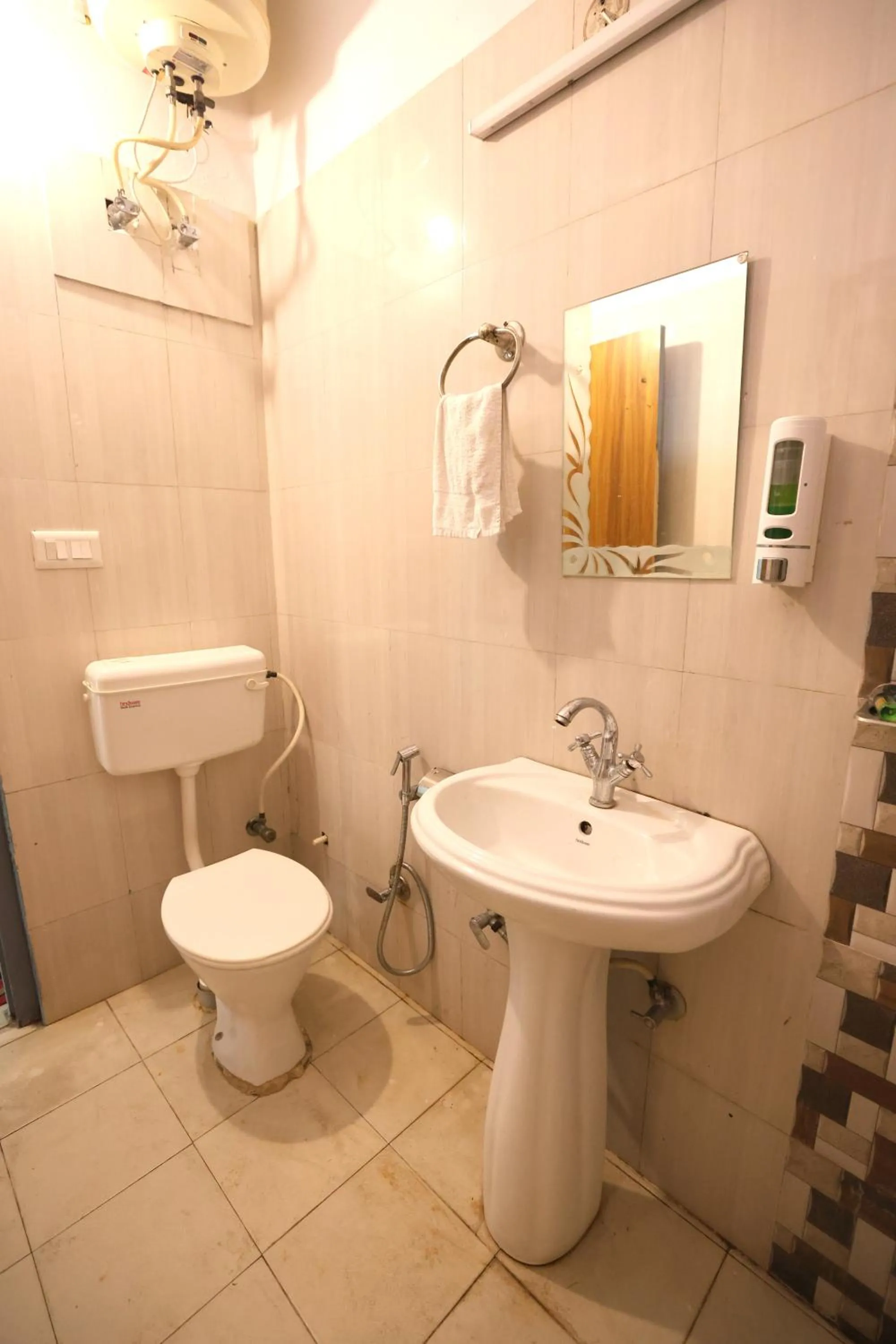 Toilet in Aranya Resort & Suites By Shivaneel Hospitality