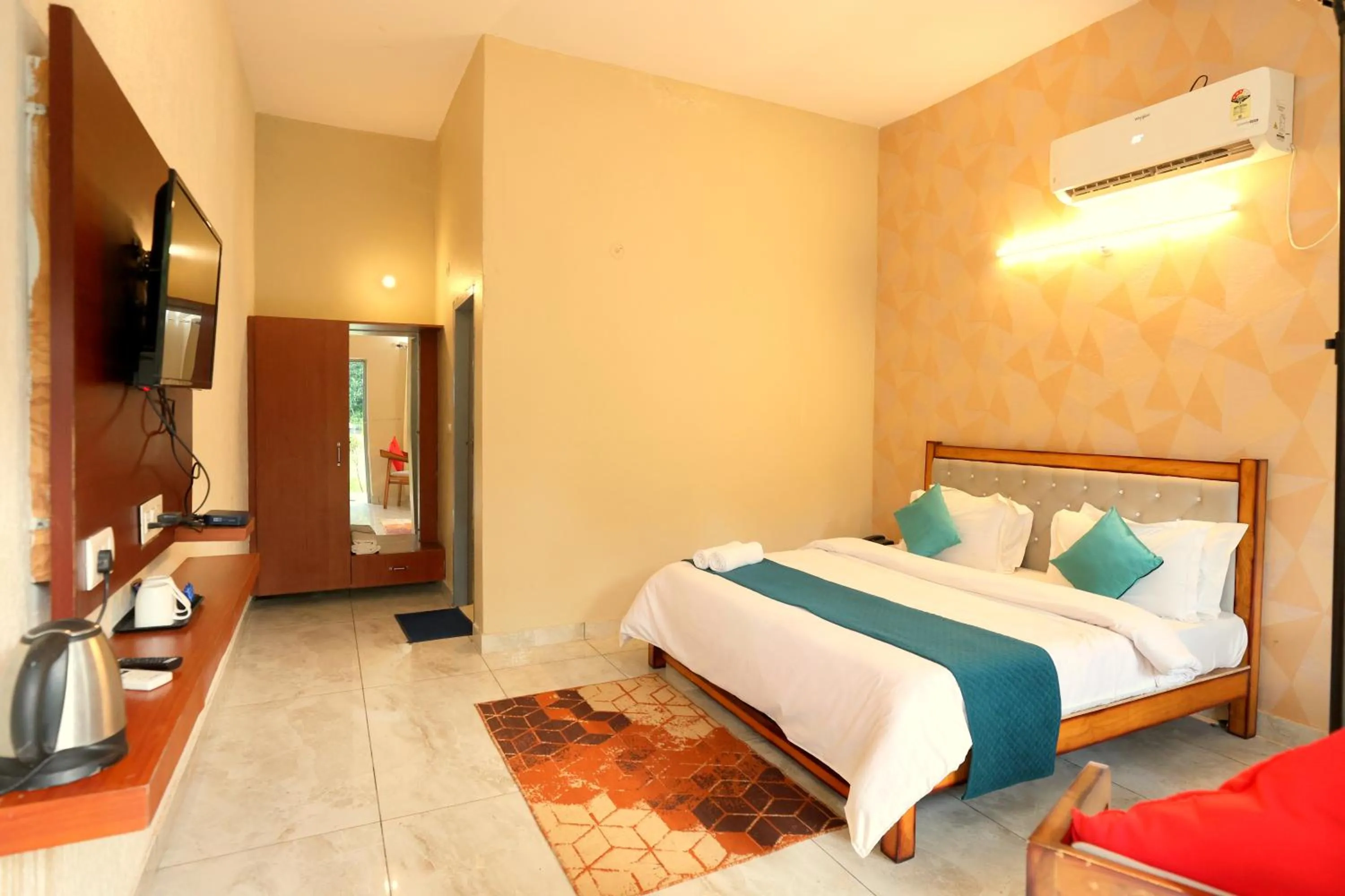 Photo of the whole room, Bed in Aranya Resort & Suites By Shivaneel Hospitality
