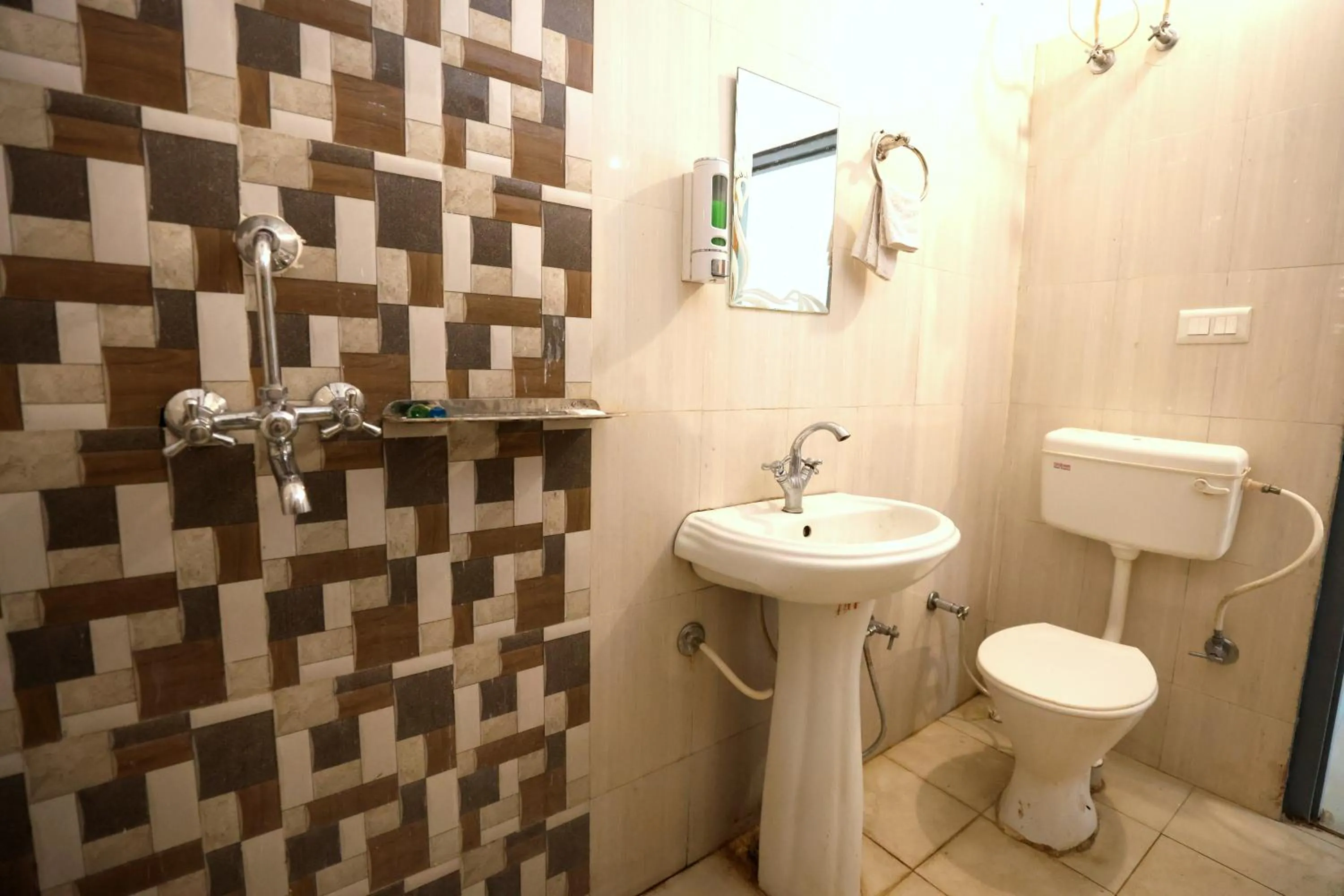 Toilet in Aranya Resort & Suites By Shivaneel Hospitality