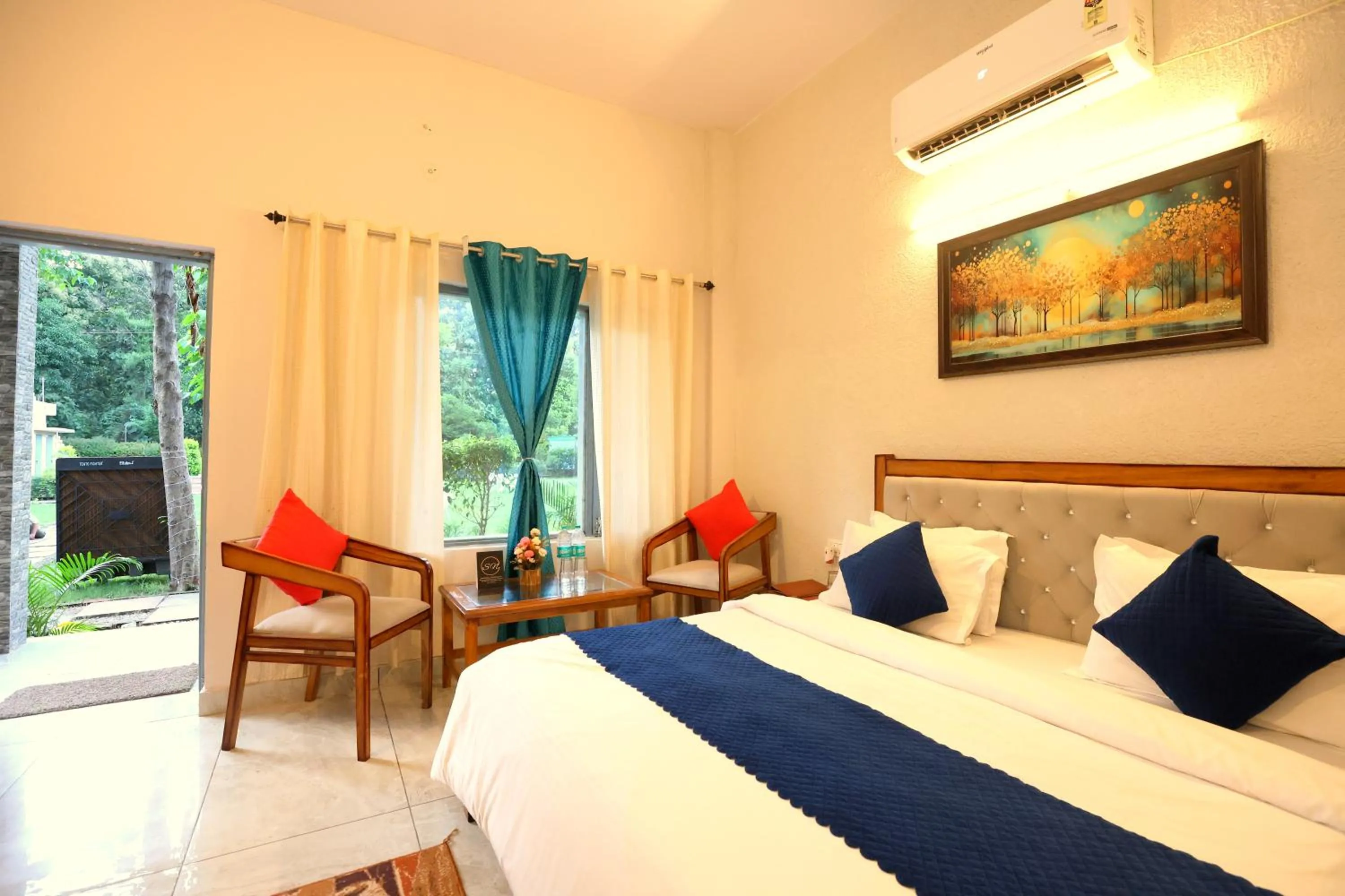 Photo of the whole room, Bed in Aranya Resort & Suites By Shivaneel Hospitality