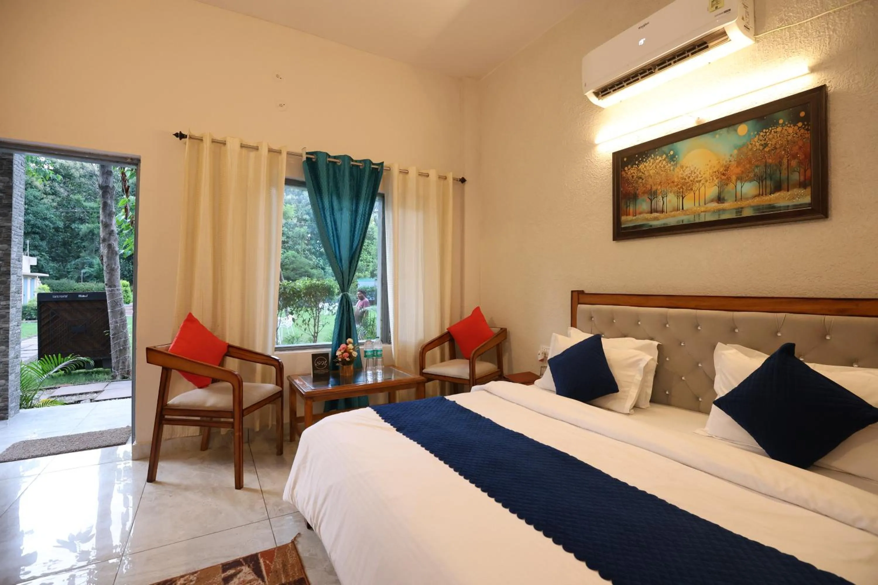 Photo of the whole room, Bed in Aranya Resort & Suites By Shivaneel Hospitality