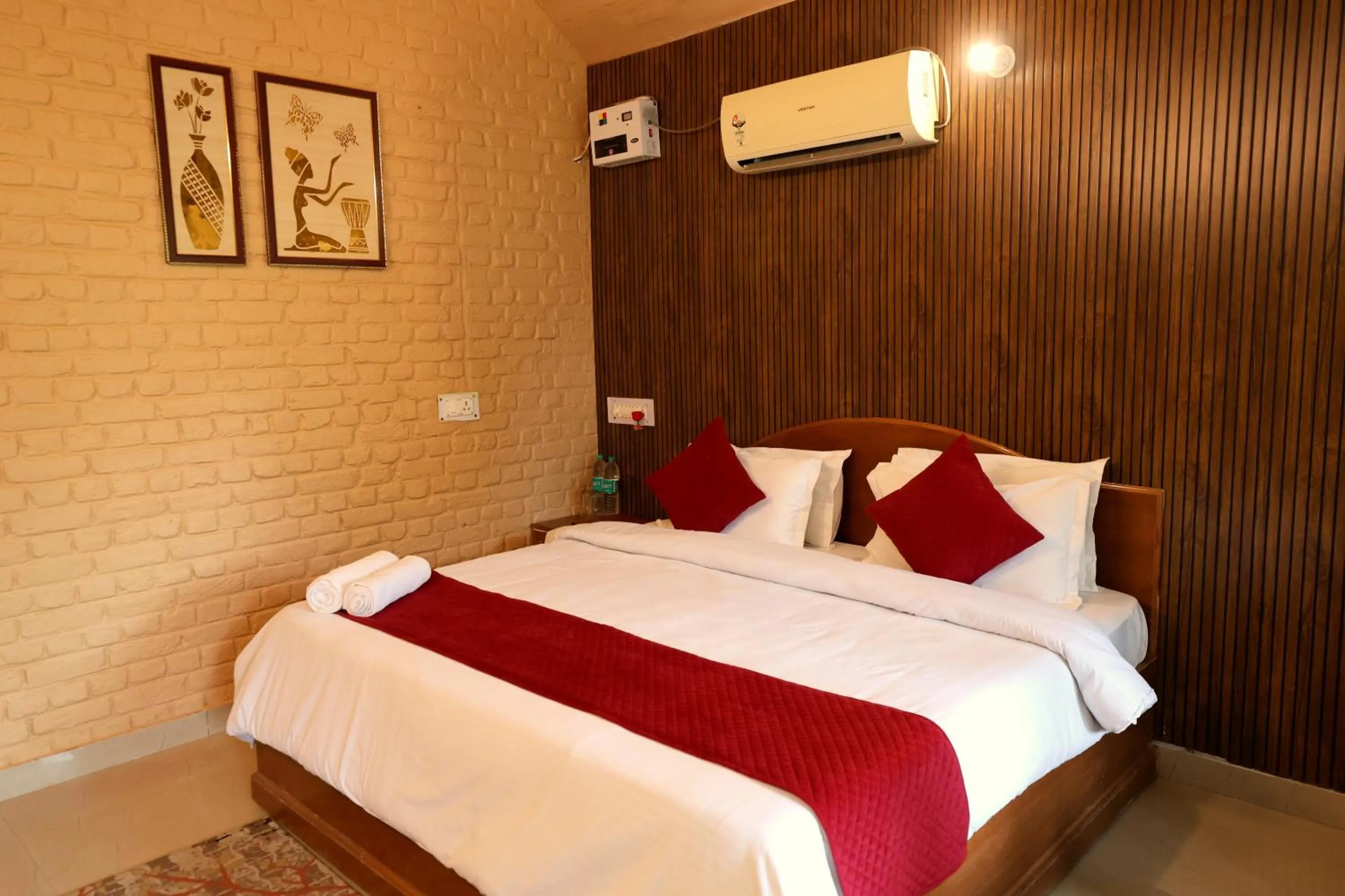 Bed in Aranya Resort & Suites By Shivaneel Hospitality