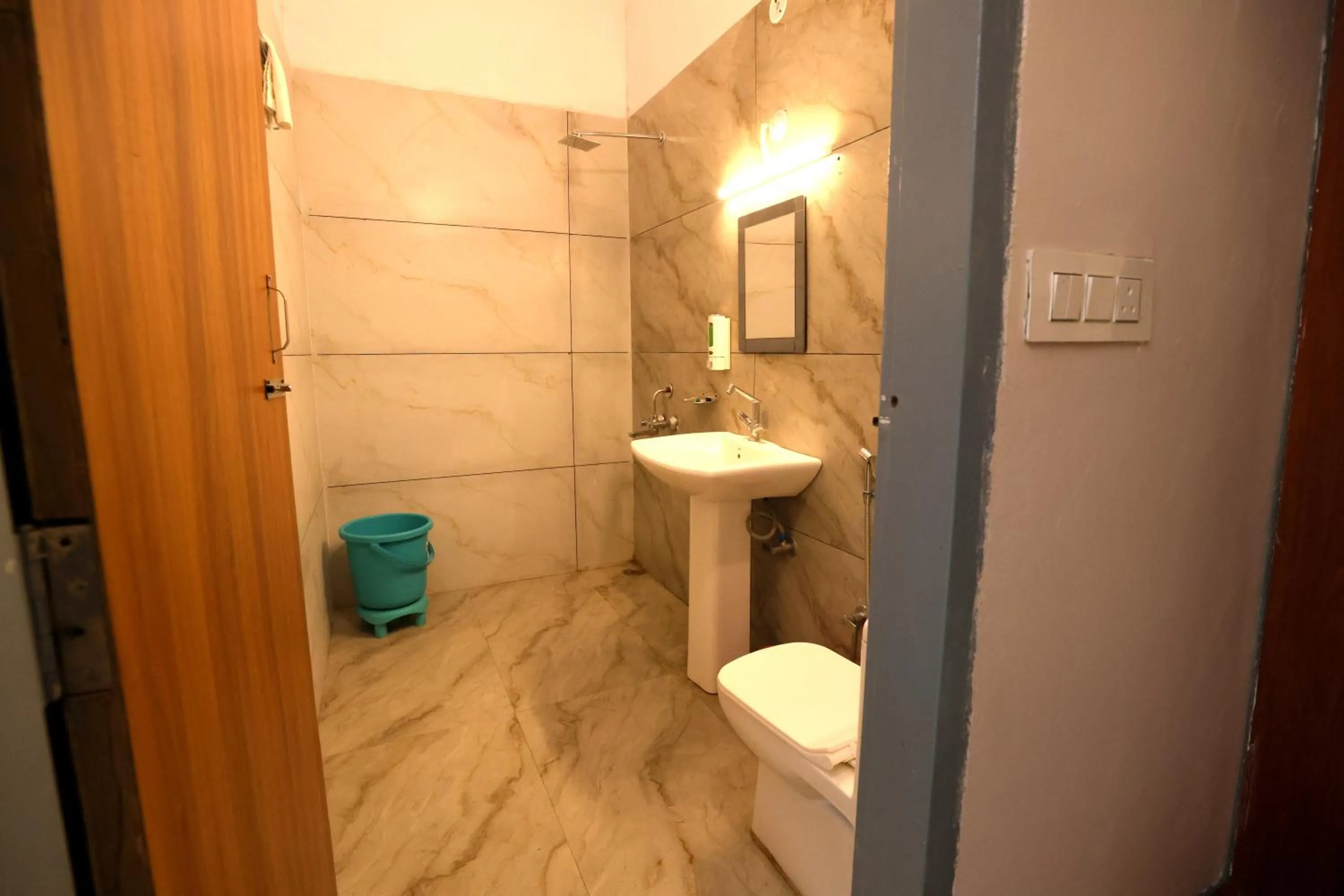 Bathroom in Aranya Resort & Suites By Shivaneel Hospitality