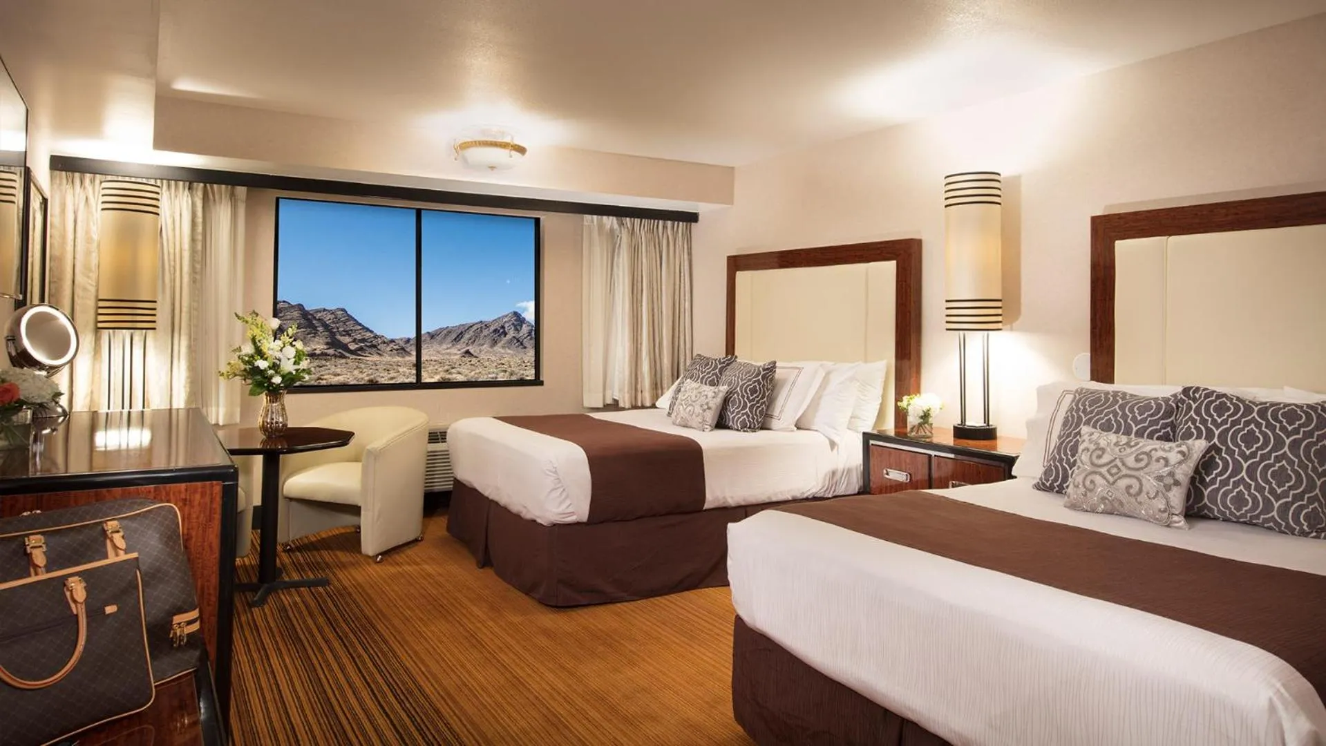 Bed in Rainbow Hotel Casino by Peppermill Resorts