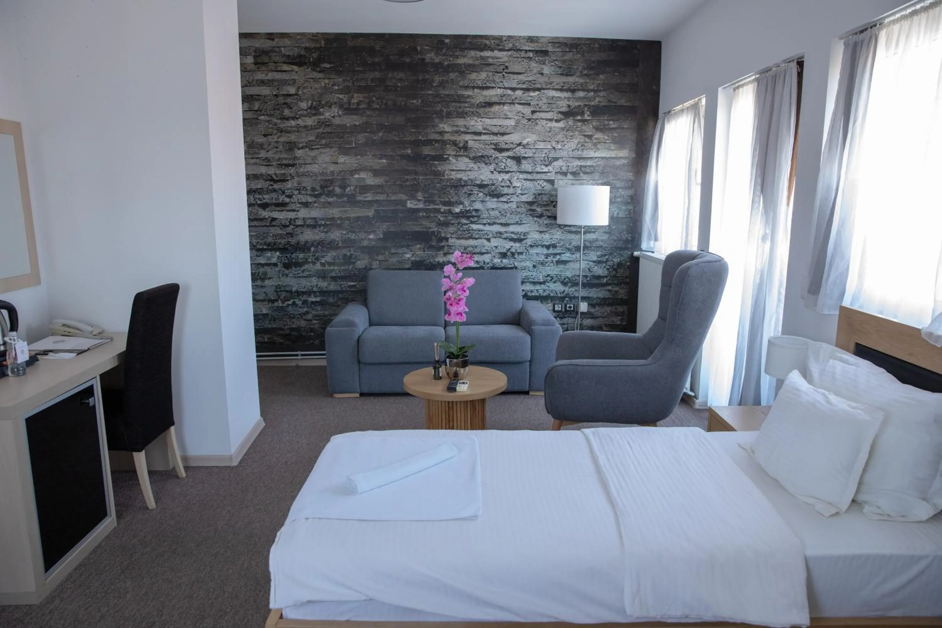 Seating area, Bed in Garni Hotel Biser