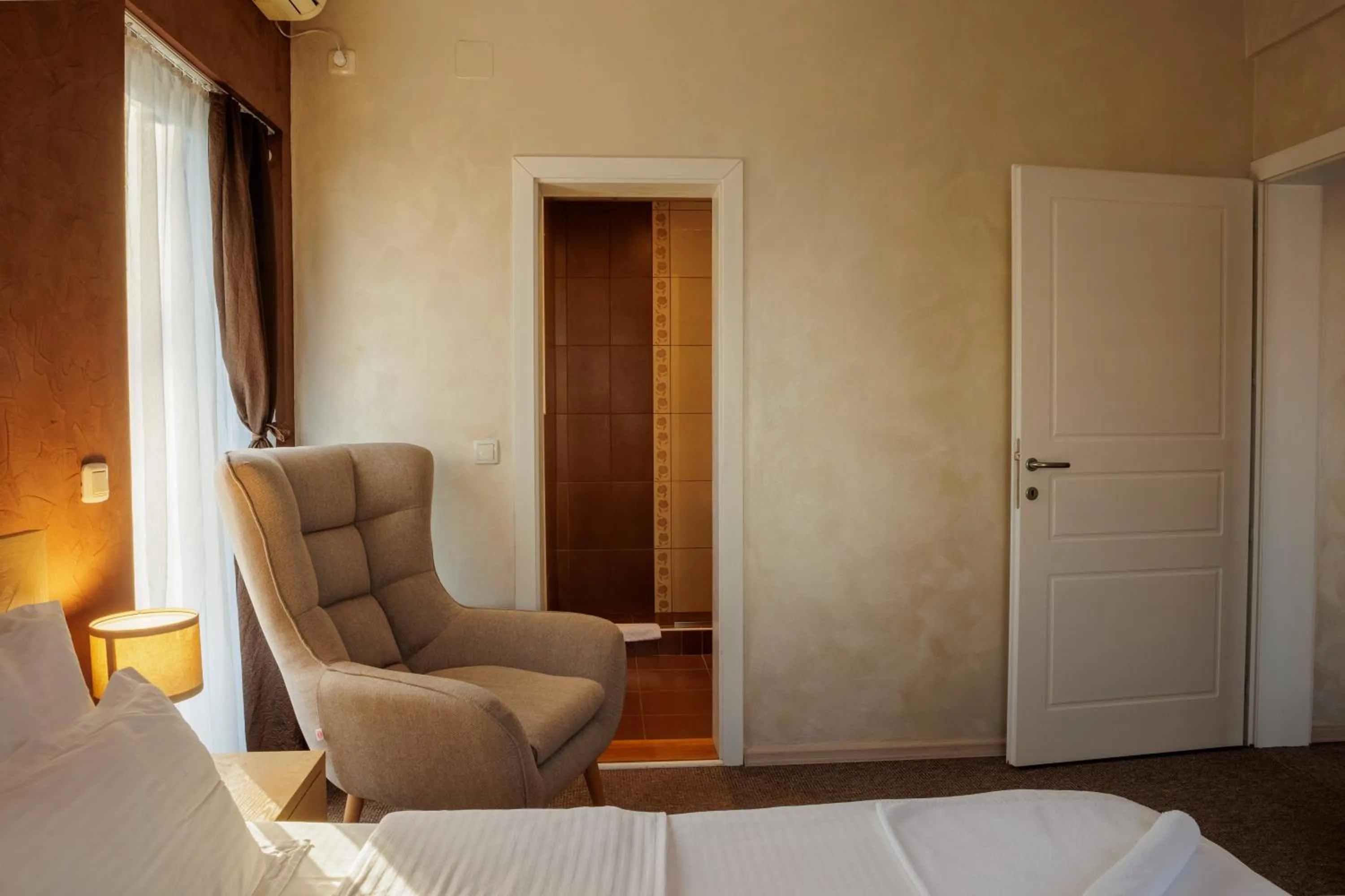 Bed in Garni Hotel Biser