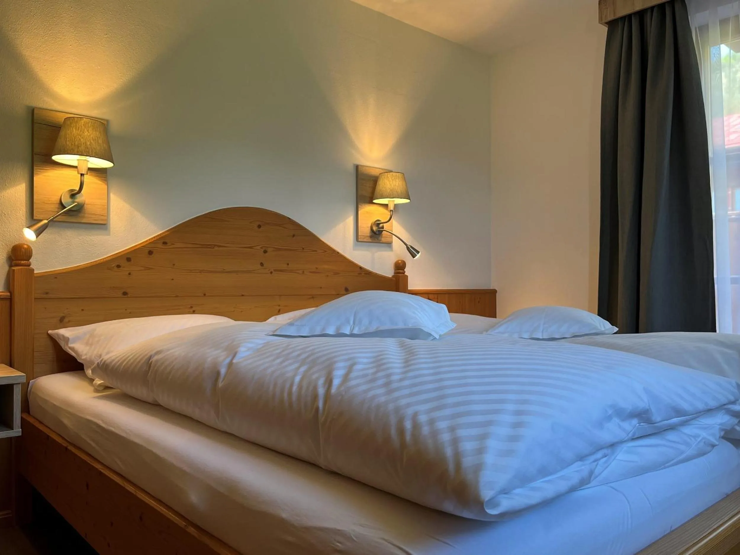 Bed in Ferienwohnungen Beim Hausbacher