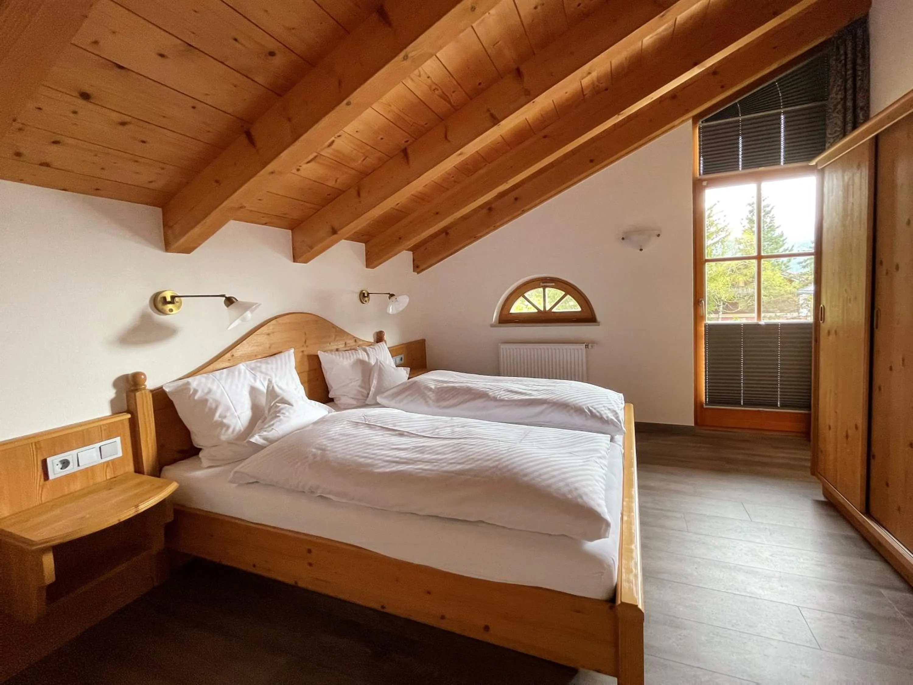 Bed in Ferienwohnungen Beim Hausbacher