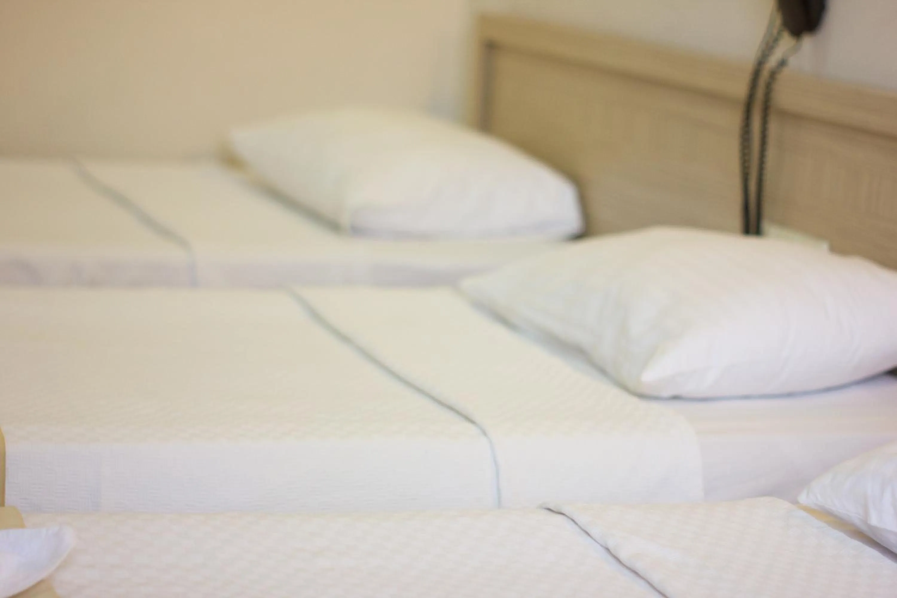 Bed in Denizhan Hotel