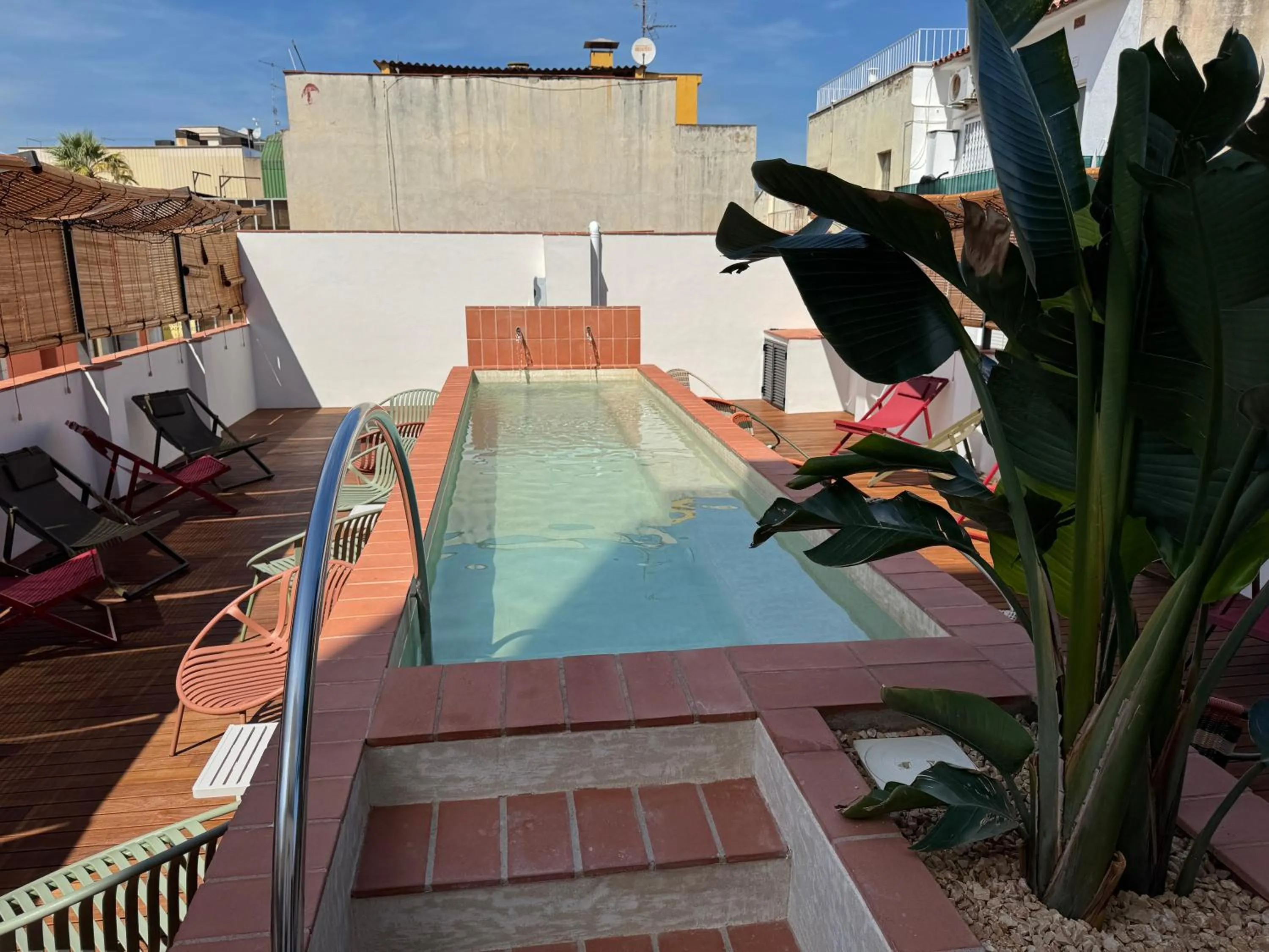 Swimming pool in BELLADORA Hotel Boutique