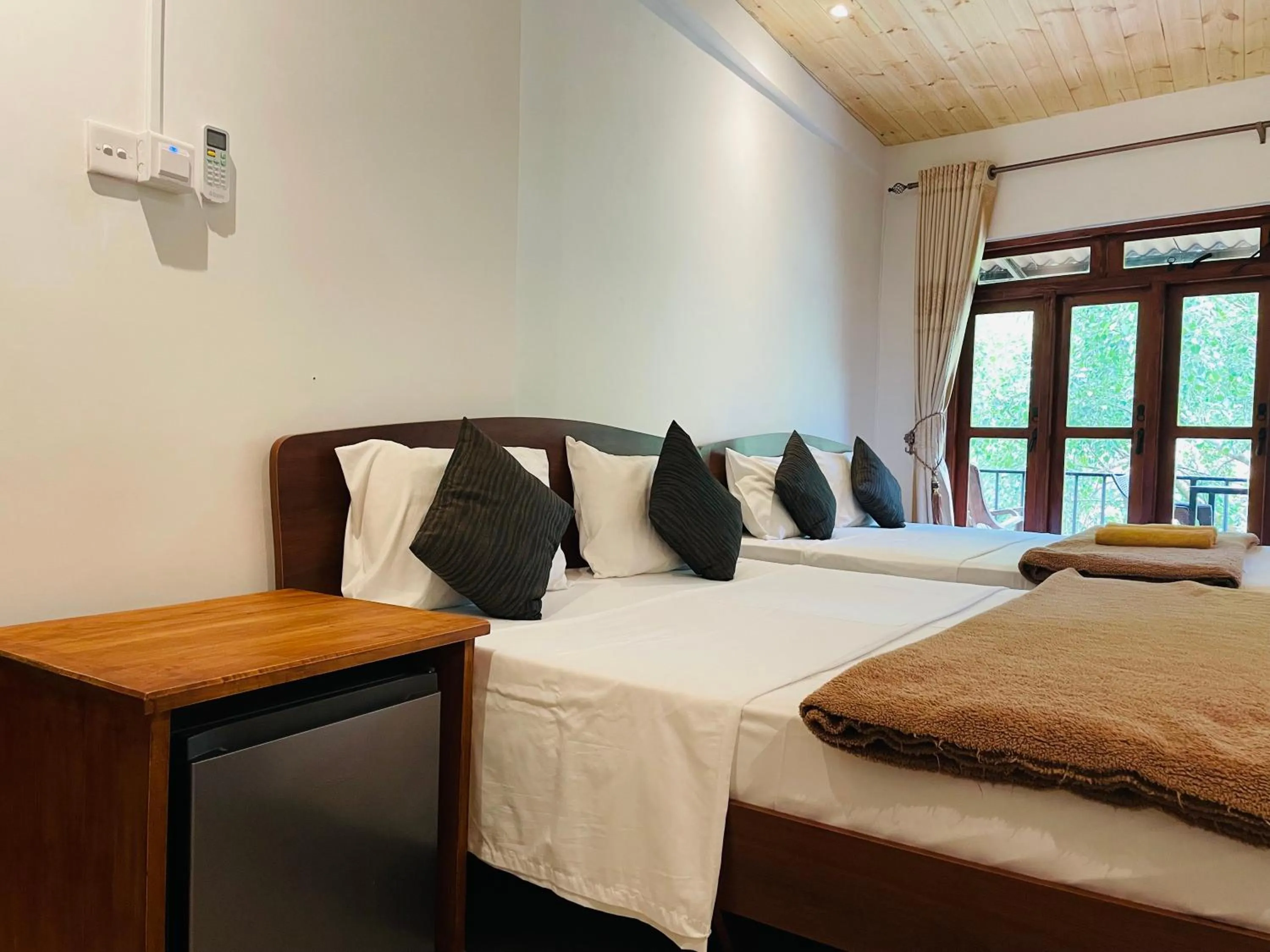 minibar, Bed in Wild Resort Ella