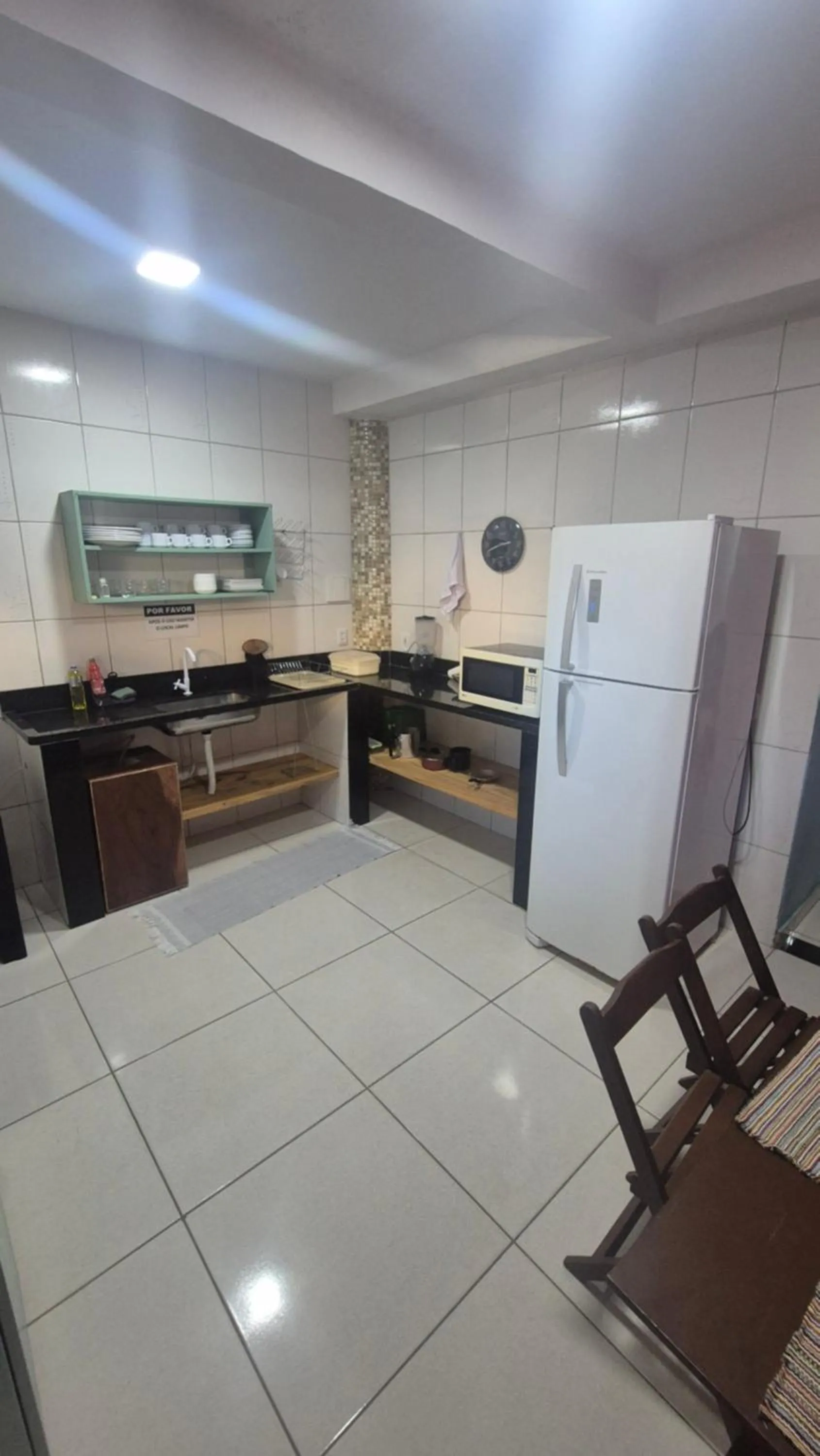 Communal kitchen in Magia D'ajuda Hospedagem - Centrinho, próximo à Mucugê