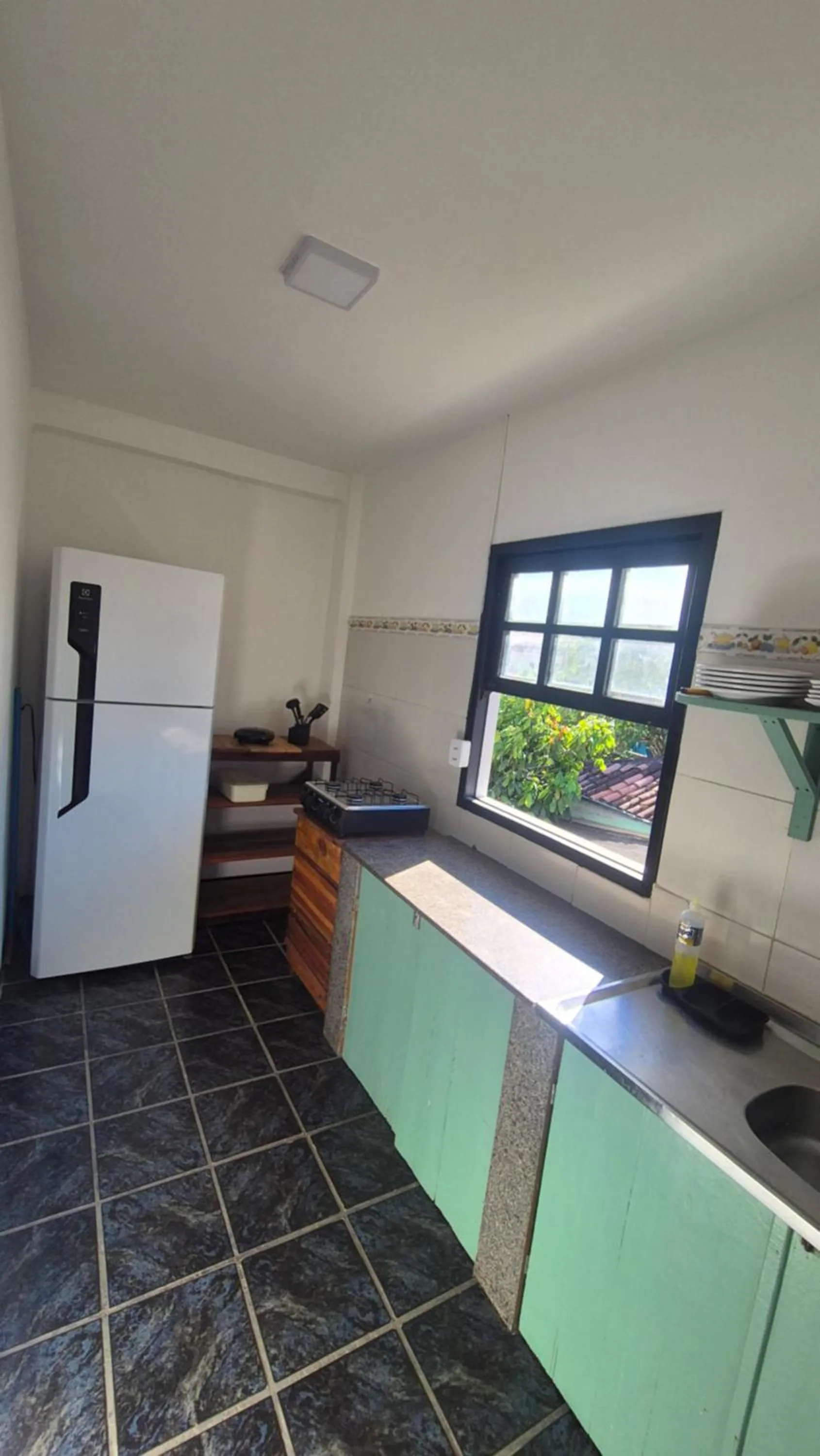 Kitchen or kitchenette in Magia D'ajuda Hospedagem - Centrinho, próximo à Mucugê
