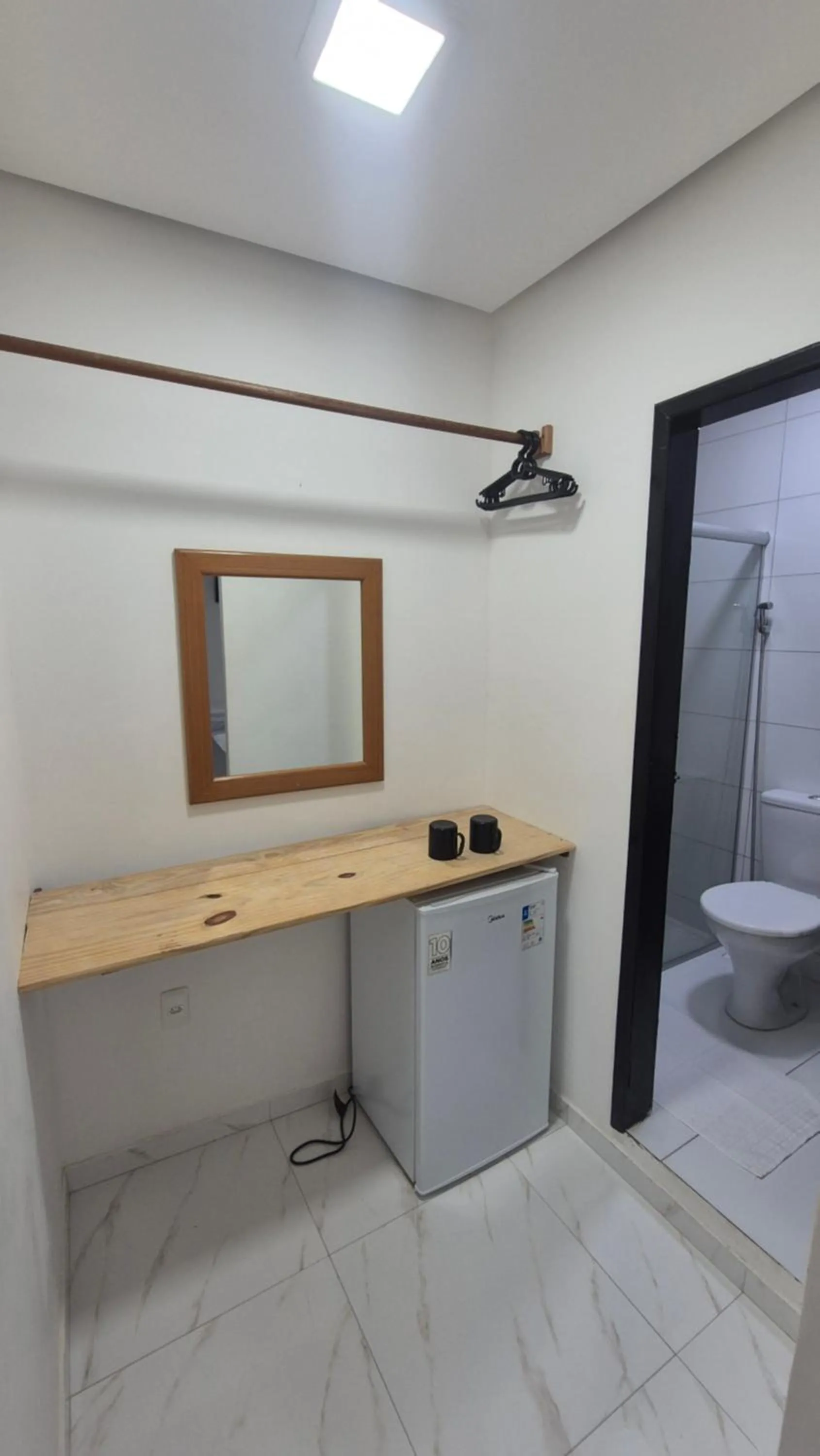 minibar in Magia D'ajuda Hospedagem - Centrinho, próximo à Mucugê