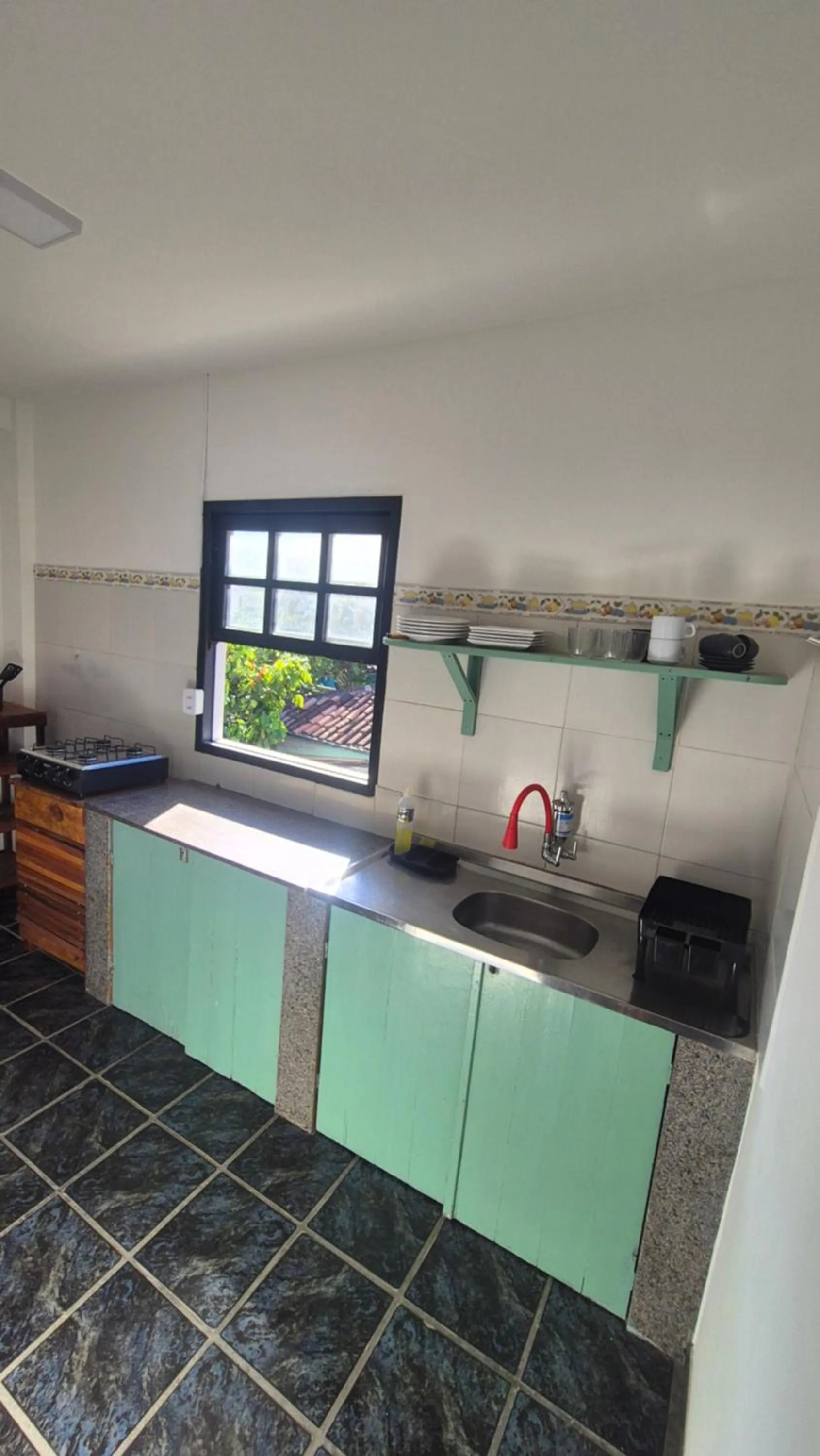 Kitchen or kitchenette in Magia D'ajuda Hospedagem - Centrinho, próximo à Mucugê