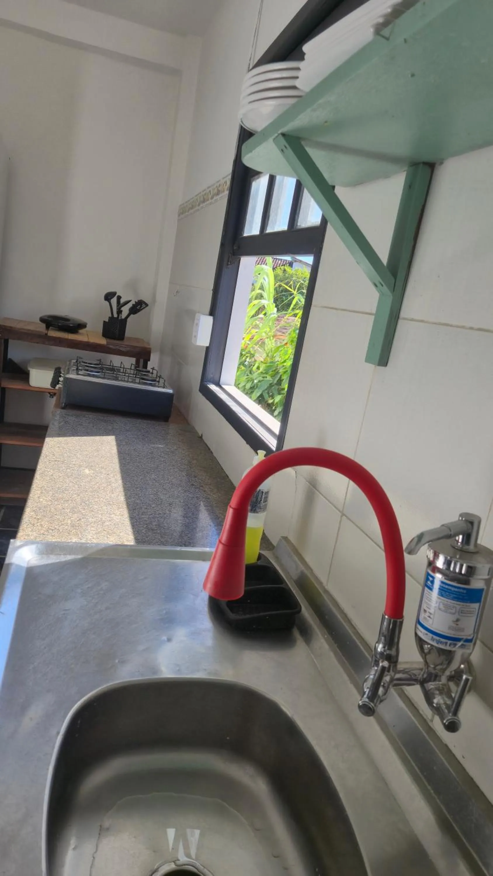 Kitchen or kitchenette in Magia D'ajuda Hospedagem - Centrinho, próximo à Mucugê