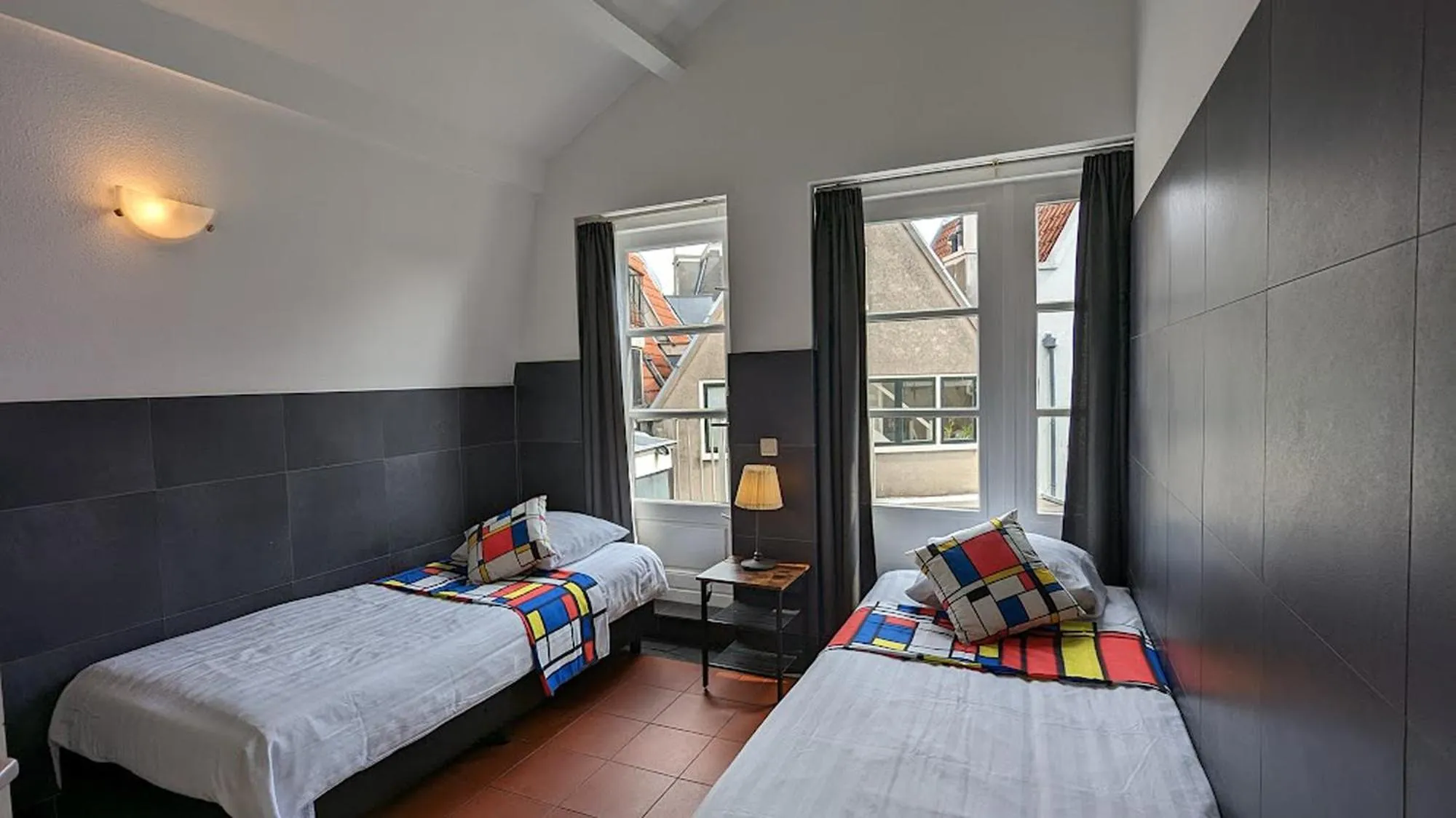 Bed in The Amsterdam Hotel Apartment in the Center